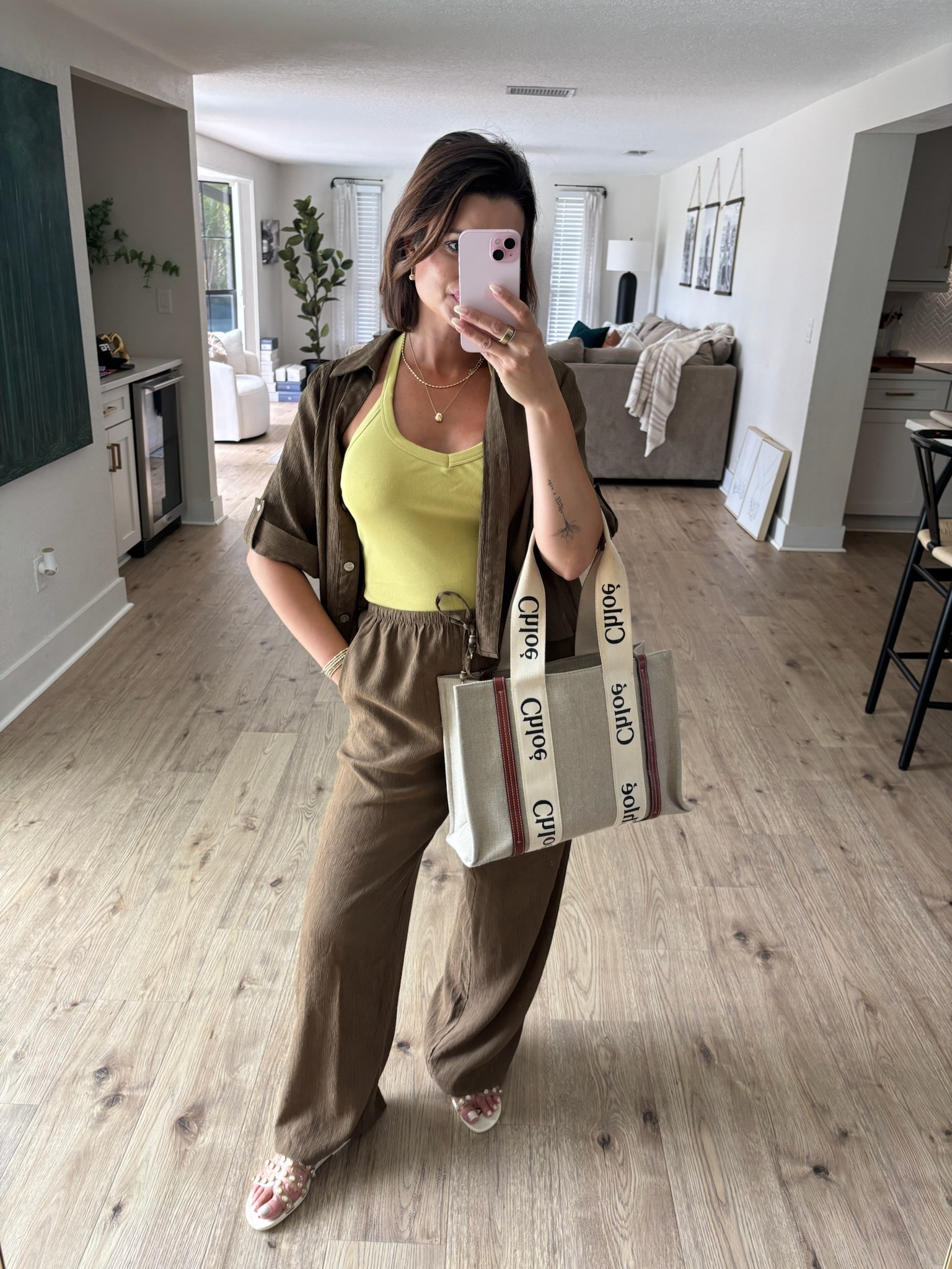 A great vacation or resortwear outfit idea! This look would also be perfect for a travel day. 

My halter tank top is double lined and has a built in bra. So comfy and stretchy + comes in so many colors!

#LTKootd #LTKgrwm #LTKdayinmylife