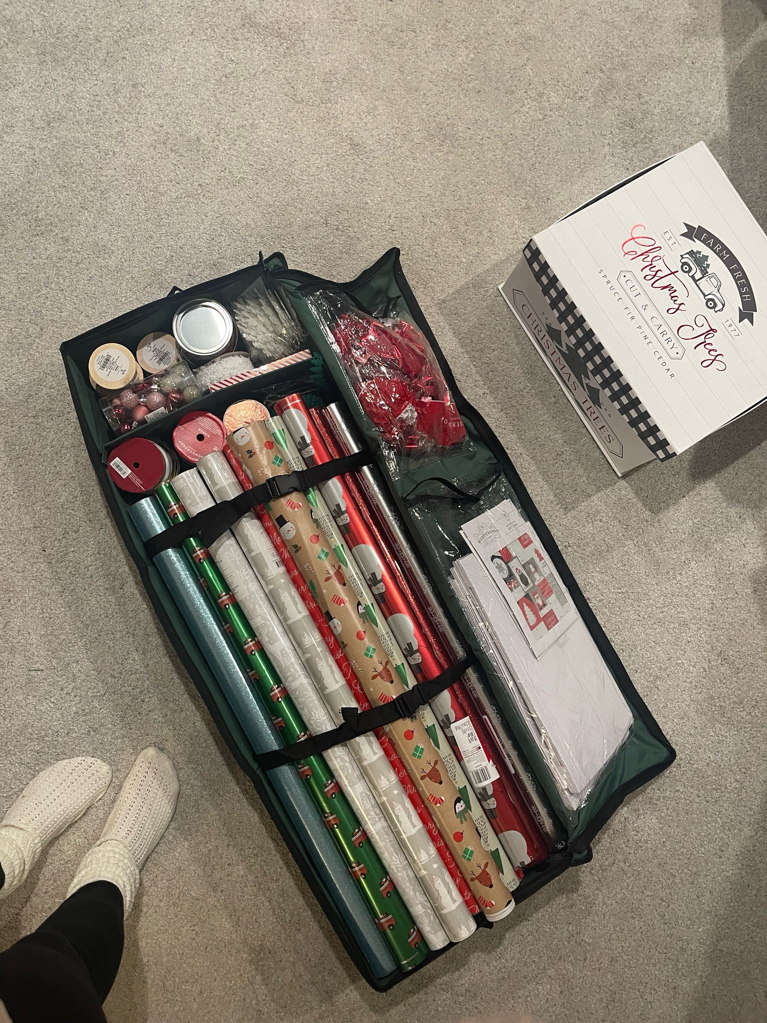 Finally putting away / re-organizing the Christmas decor and this soft container is the absolute best for housing all of our wrapping supplies 👏🏻👏🏻👏🏻 🎁🧵🎀🎄

#LTKSeasonal #LTKhome #LTKfindsunder100