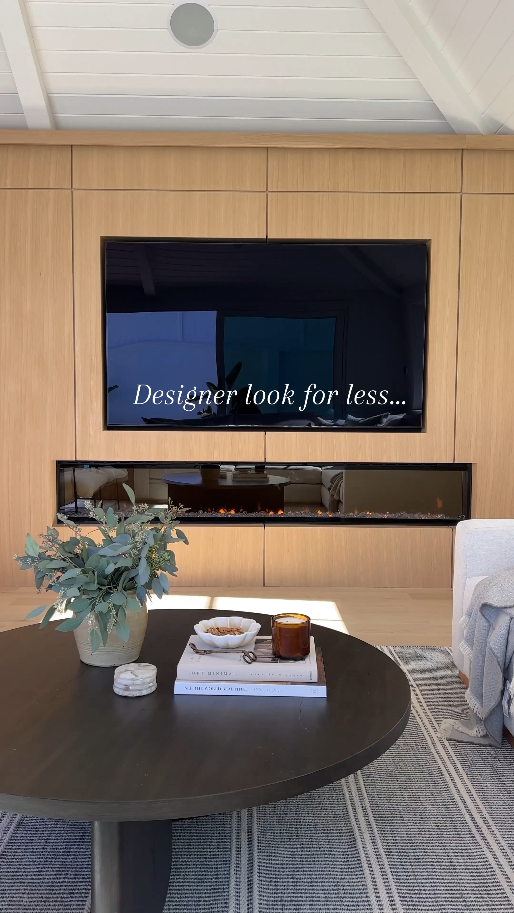 Designer look for less! Black Wick cutter, coffee table books, vintage vase vessel eucalyptus fireplace insert blue stripe rug black coffee table wood coffee table coasters neutral decor living room exit Annie selke vintage rug shop Amazon Walmart target   

#LTKsalealert #LTKfindsunder50 #LTKover40