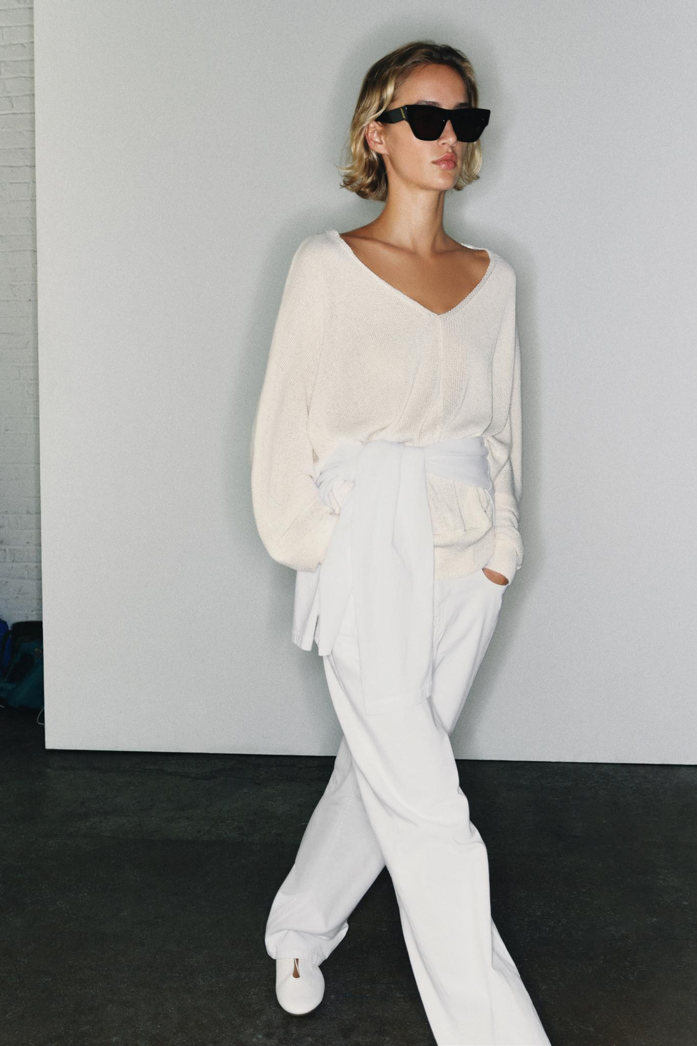 Jumper with a V-neckline and long sleeves finished with cuffs and dropped armholes. | Zara US