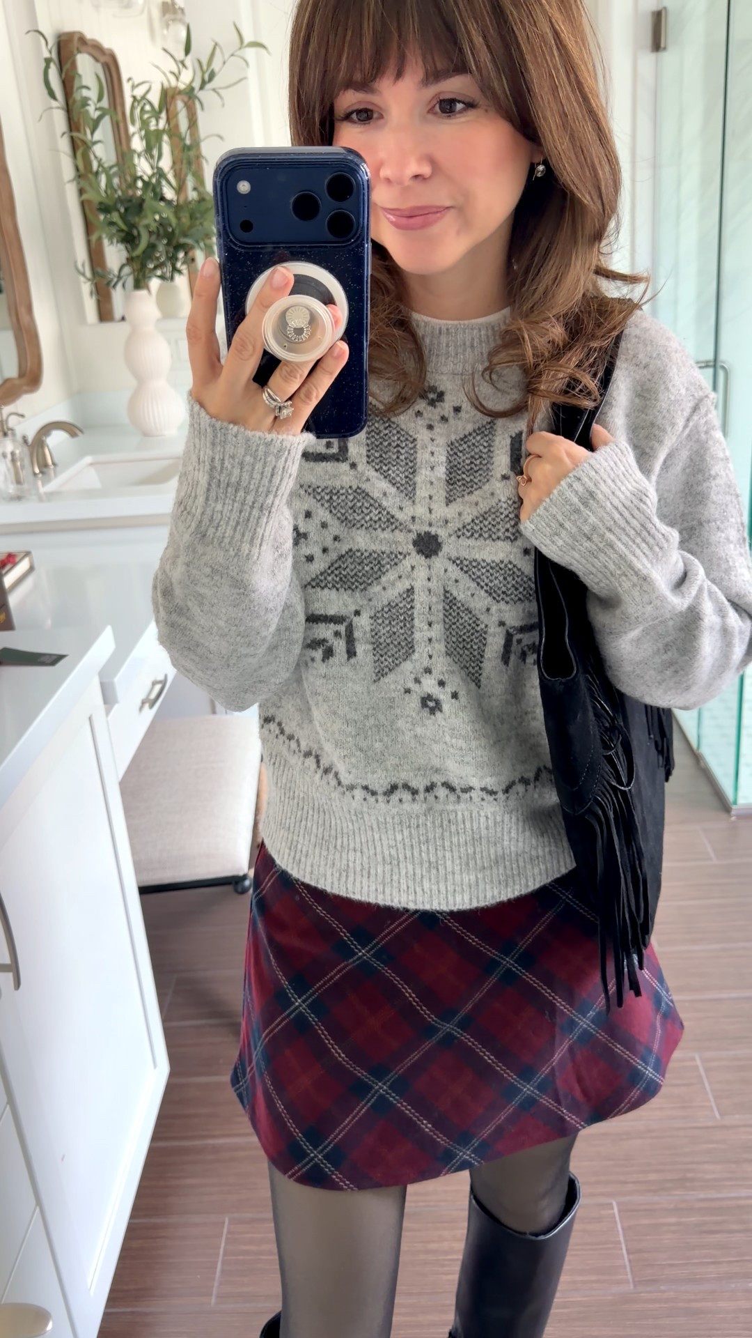 A cozy holiday outfit that works for so many things — school events, casual parties, cookie exchanges, or a day of shopping.
This fair isle sweater + plaid mini + tall boots is such a cute petite-friendly combo for winter.
Linking my exact look + similar pieces in all price points.”

Sweater XS 
Skort xs 
Boots 5.5
Amazon tights 

#LTKPetite #LTKHoliday