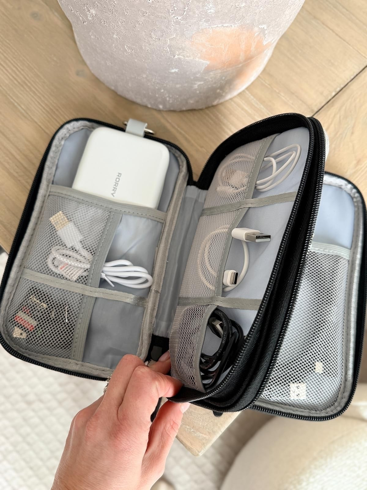 Travel light and stay powered up with this compact portable charger and cable organizer. Perfect for on-the-go! #techgadgets #travelessentials

#LTKmomlife #LTKHome #LTKTravel