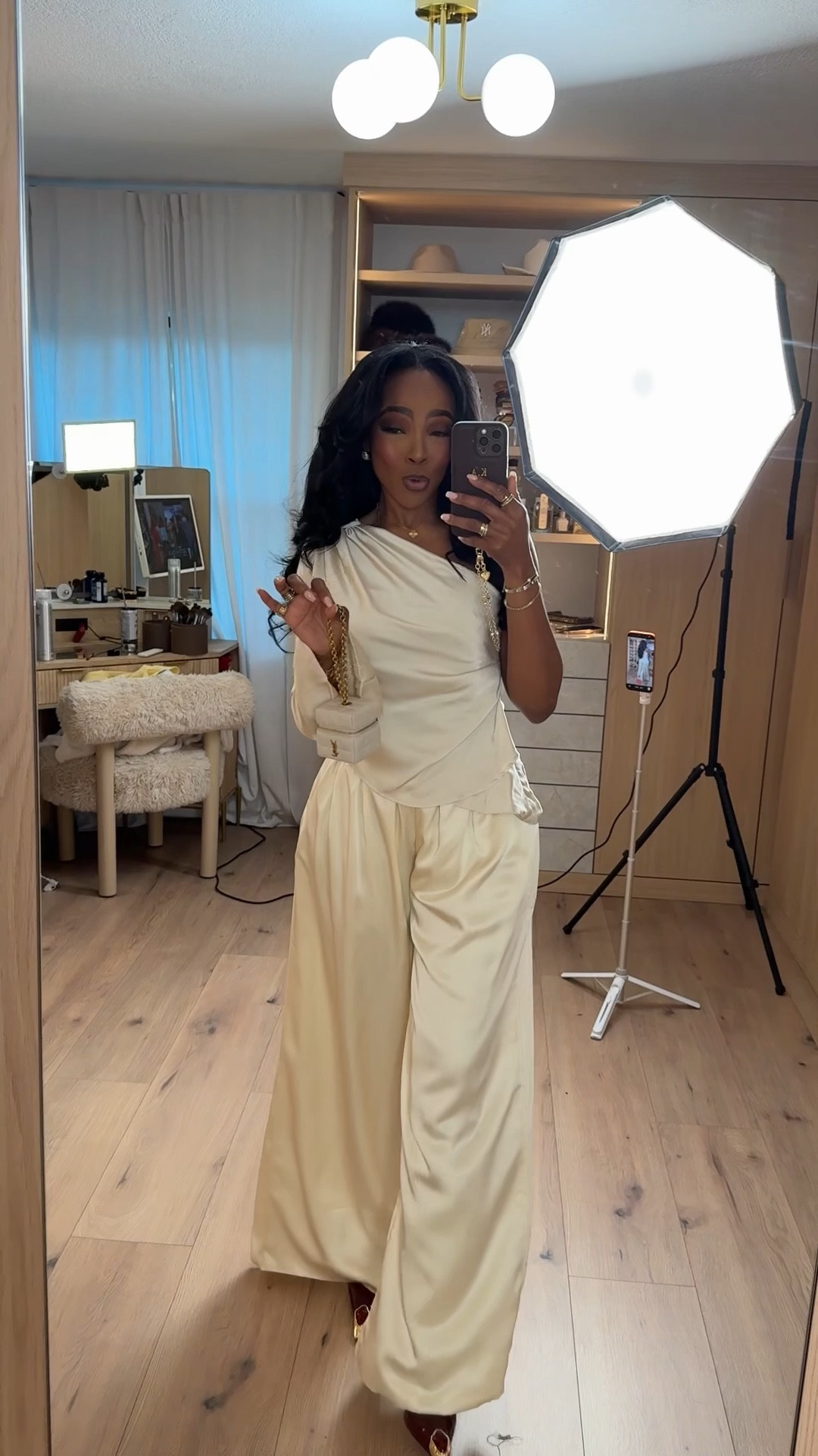 Effortlessly elevated with soft satin draping and a relaxed, tailored feel — this ivory set is one of those looks that instantly feels chic without trying too hard.

The one-shoulder top paired with wide-leg satin pants gives that modern, understated luxury vibe that works for so many occasions. Dress it up with heels and statement jewelry or keep it minimal for a clean, polished moment.

Perfect for holiday dinners, NYE plans that aren’t full glam, winter celebrations, cocktail events, engagement parties, and elegant nights out.

📏 Fit + Details:
• One-shoulder satin top — true to size, soft drape, flattering asymmetrical cut  
• Satin wide-leg pants — true to size, flowy fit, comfortable waistband, moves beautifully  

📏 Sizing: Size Small  
📏 Measurements: 5’4” · 138 lbs · 34D · 27” waist · 40” hips  

Chic satin set, ivory holiday outfit, NYE dinner outfit ideas, elegant winter looks, elevated neutral outfits, satin wide leg pants, modern occasion wear.

Follow me on Instagram and YouTube @kirasfashionfinds

#LTKselfcare #LTKootd #LTKgrwm