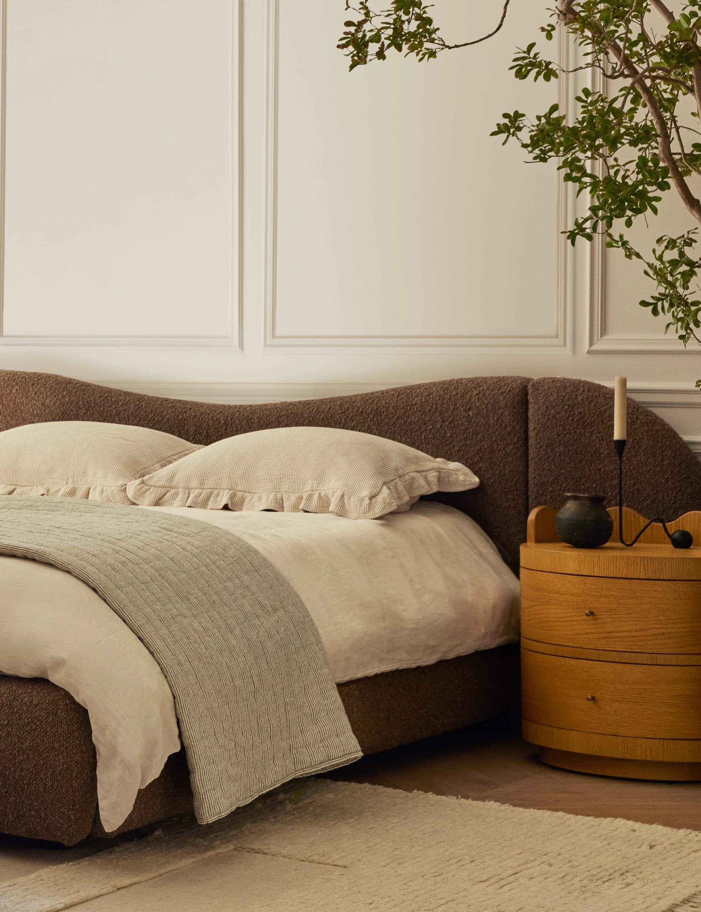 Cozy Modern Bedroom Design with Neutral Tones and Textural Details 

 