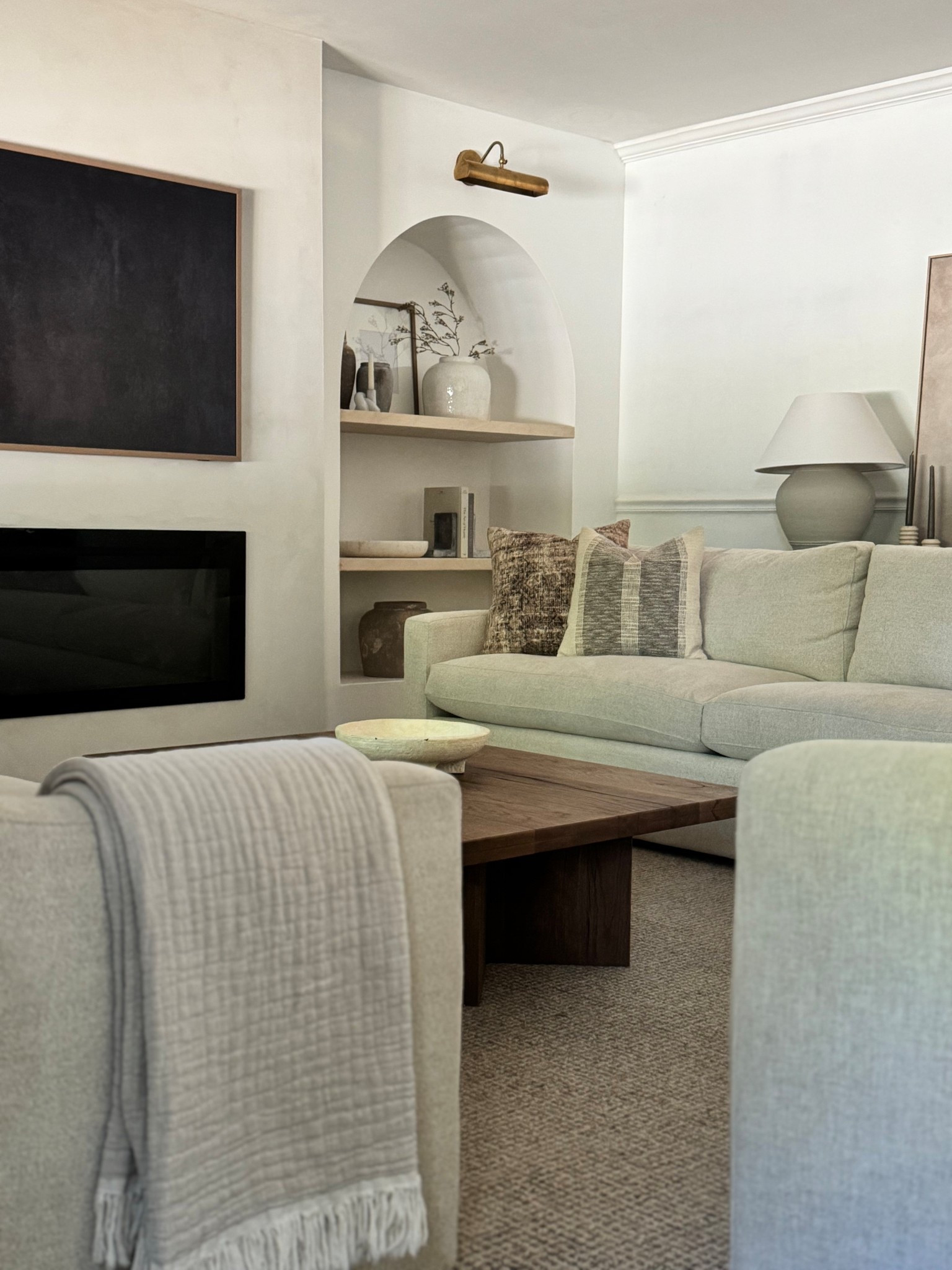 My TV art is a dark brown and I love it so much! Kept the rest of my living room space light and bright 

#LTKHome