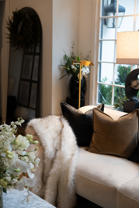 I’m absolutely loving my cozy Christmas living room! The soft glow from the lamp, festive greenery, and modern black-and-white décor make this space feel so magical. The big window lets in the perfect winter light, adding warmth and charm to every corner. It’s my dream modern holiday home, ready for Christmas gatherings and cozy nights in. 

 #LTKHoliday #LTKSeasonal #LTKHome