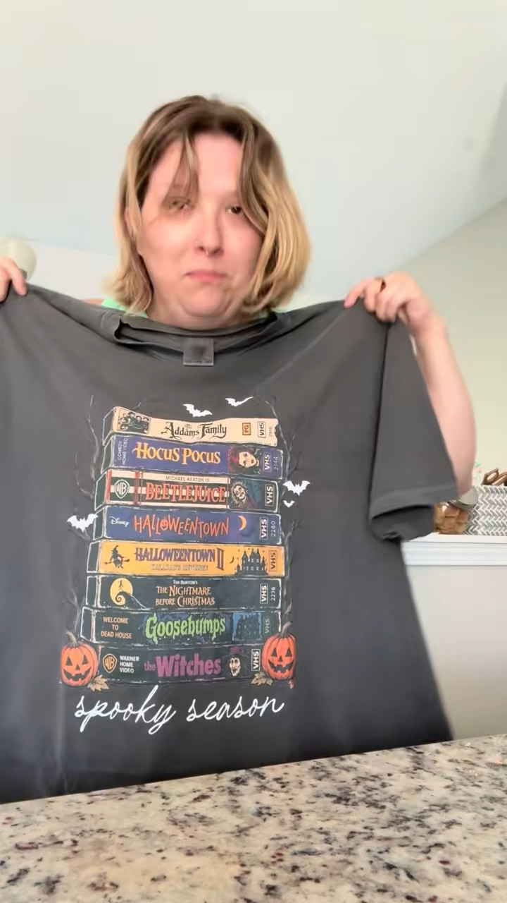 Spooky season is calling… 🎃📼

If you grew up watching Hocus Pocus, Halloweentown, Beetlejuice, The Nightmare Before Christmas, and Goosebumps, this Comfort Colors tee belongs in your fall wardrobe. 

It’s oversized, cozy, and giving all the nostalgic Halloween vibes. 🖤🍂

Linked ⬇️ 🎃

#LTKmomlife #LTKSeasonal #LTKdayinmylife