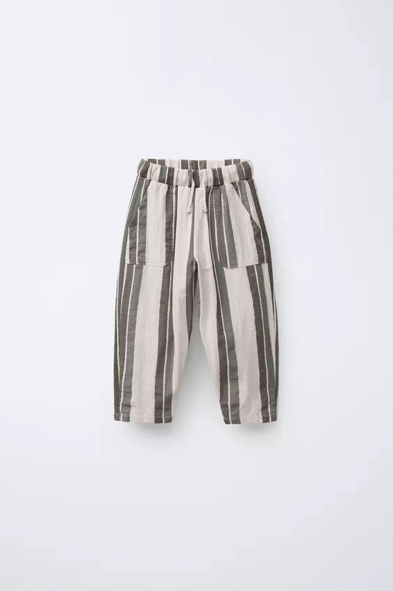 Baggy-style trousers in a contrast fabric with an elasticated waistband and adjustable drawstring... | Zara UK