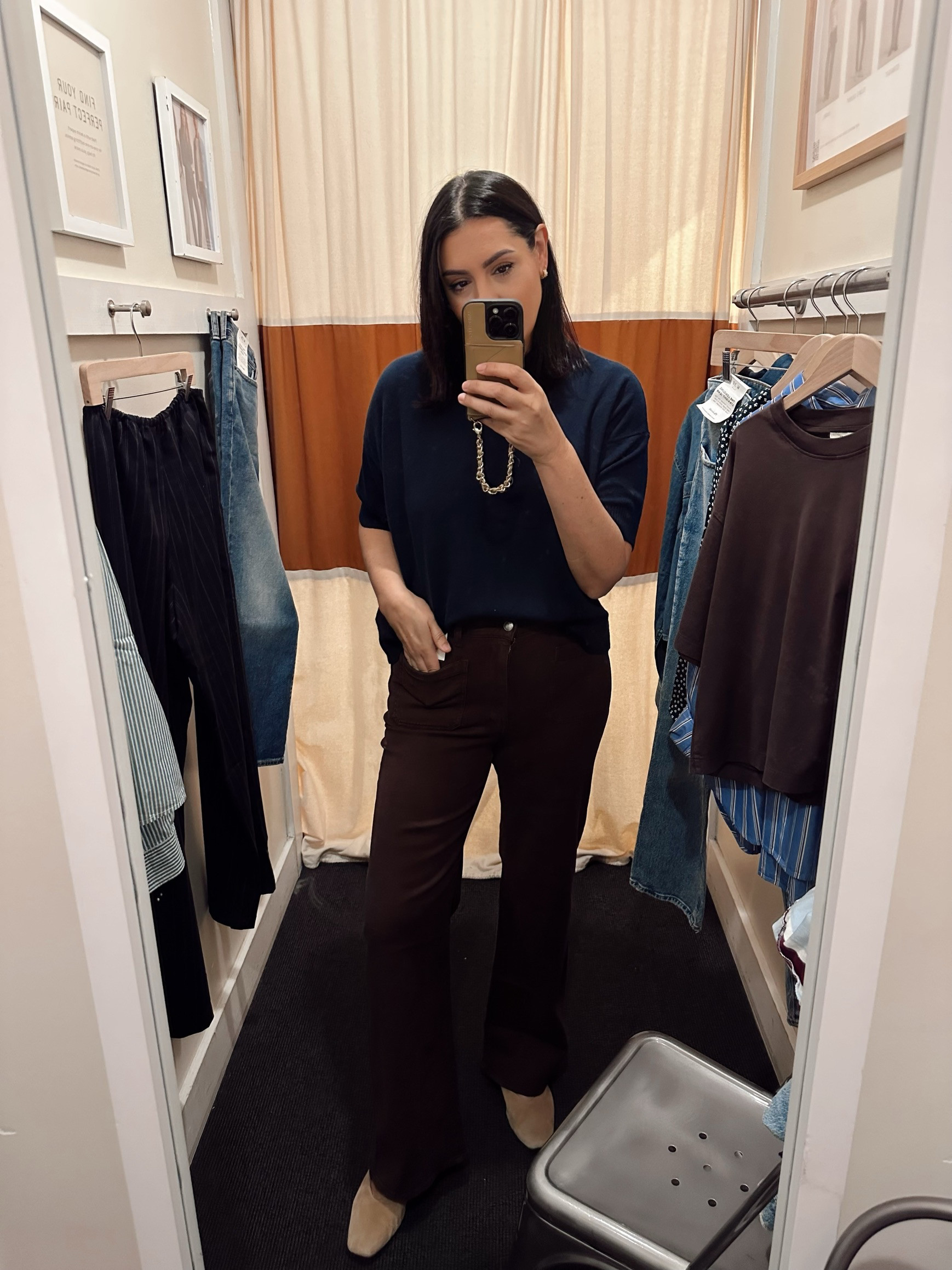 Okay these next few things aren’t on sale, but I tried them on anyways. I always love their short sleeve sweater tees and I want this one in navy! I think it will be a staple this fall / winter. I’m in the large, it runs loose overall.

I picked up these pants! It’s the cutest fit, slightly wide leg and patch pockets. Sorry it’s hard to see here – they’re a dark brown and will get lots of wear this fall. The 29 worked for me, they run big.
 

 
