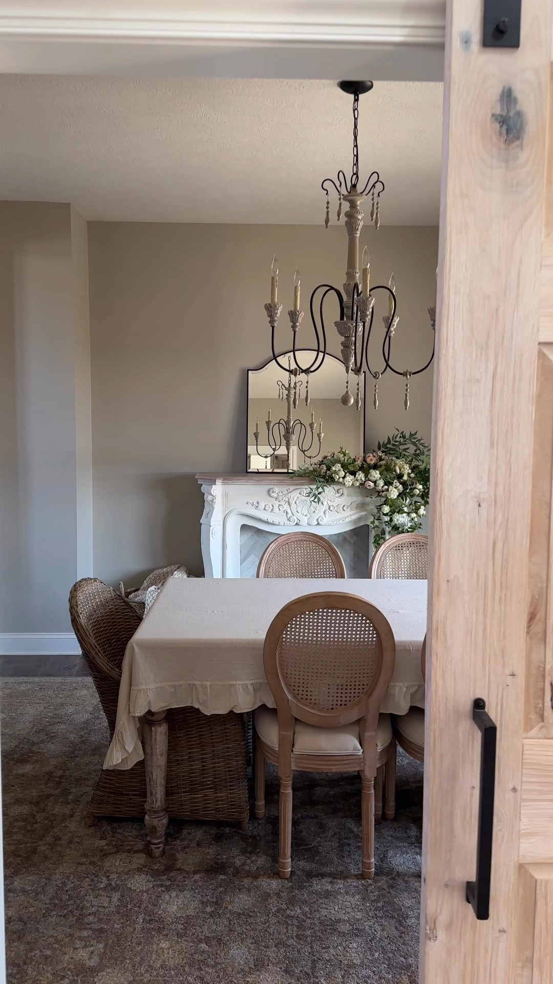 Afloral spring mantel 

Dining room / cane chairs / dining table / French country / rustic / elegant / chandelier / fireplace mantel / ruffle tablecloth / arch mirror 

#LTKSpringSale #LTKHome #LTKWatchNow