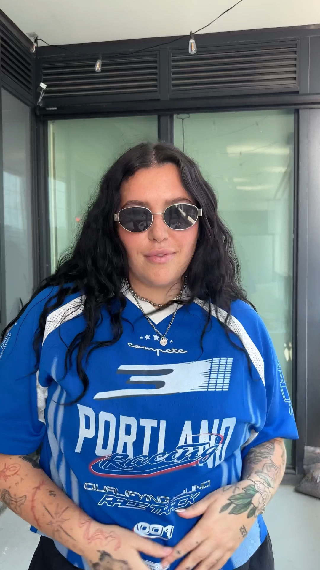Sporty sapphic summer 🏁 Cropped nylon pants, a vintage racecar jersey, and bright red Pumas = effortless cool for errands, park hangs, or just looking fast while doing nothing. Silver sunglasses to seal the deal. Linked it all for the girls, gays & theys 🔗

#LTKStyle #QueerFashion #MascLesbianStyle #SportyOutfitInspo #RedPumas #RacecarJersey #SummerErrandsFit #TomboyFemme #CoolGirlStyle #CasualQueerFashion 

 