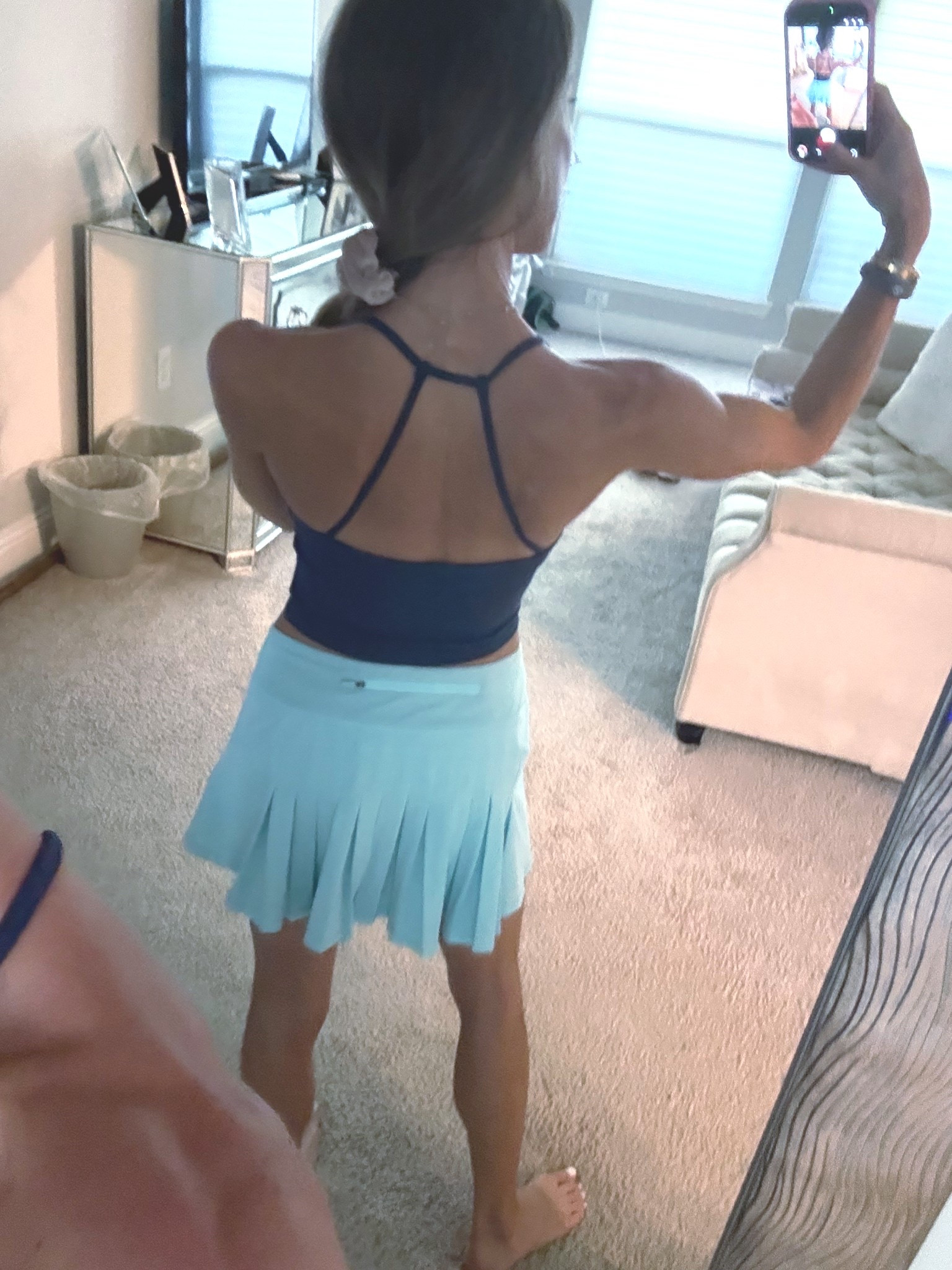 The back of this strappy tank size xs with Amazon pleated tennis skirt 
Walking outfit 

#LTKActive #LTKPetite
