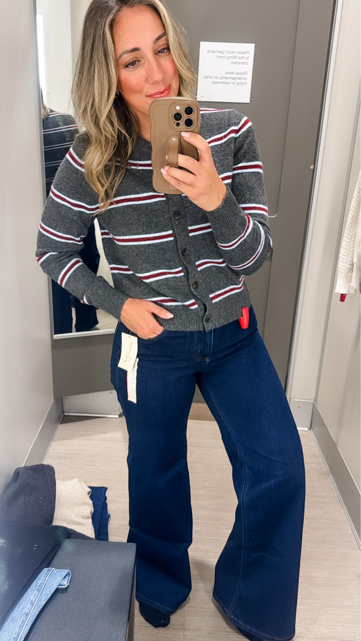 Target try-on find 🤎 This Levi’s striped cardigan stopped me in my tracks—the charcoal + burgundy combination feels so elevated for fall, especially paired with dark-wash wide-leg jeans. An easy outfit that looks pulled together without trying too hard. I love this for everyday, dinner out, travel, or even Thanksgiving weekend. Linking the cardigan + jeans from my Target try-on!

#LTKSeasonal #LTKPetite #LTKdayinmylife