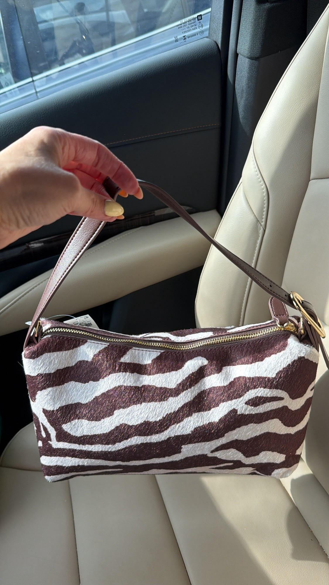 Zebra purse on sale, look for less, animal print.

#LTKSaleAlert #LTKHome