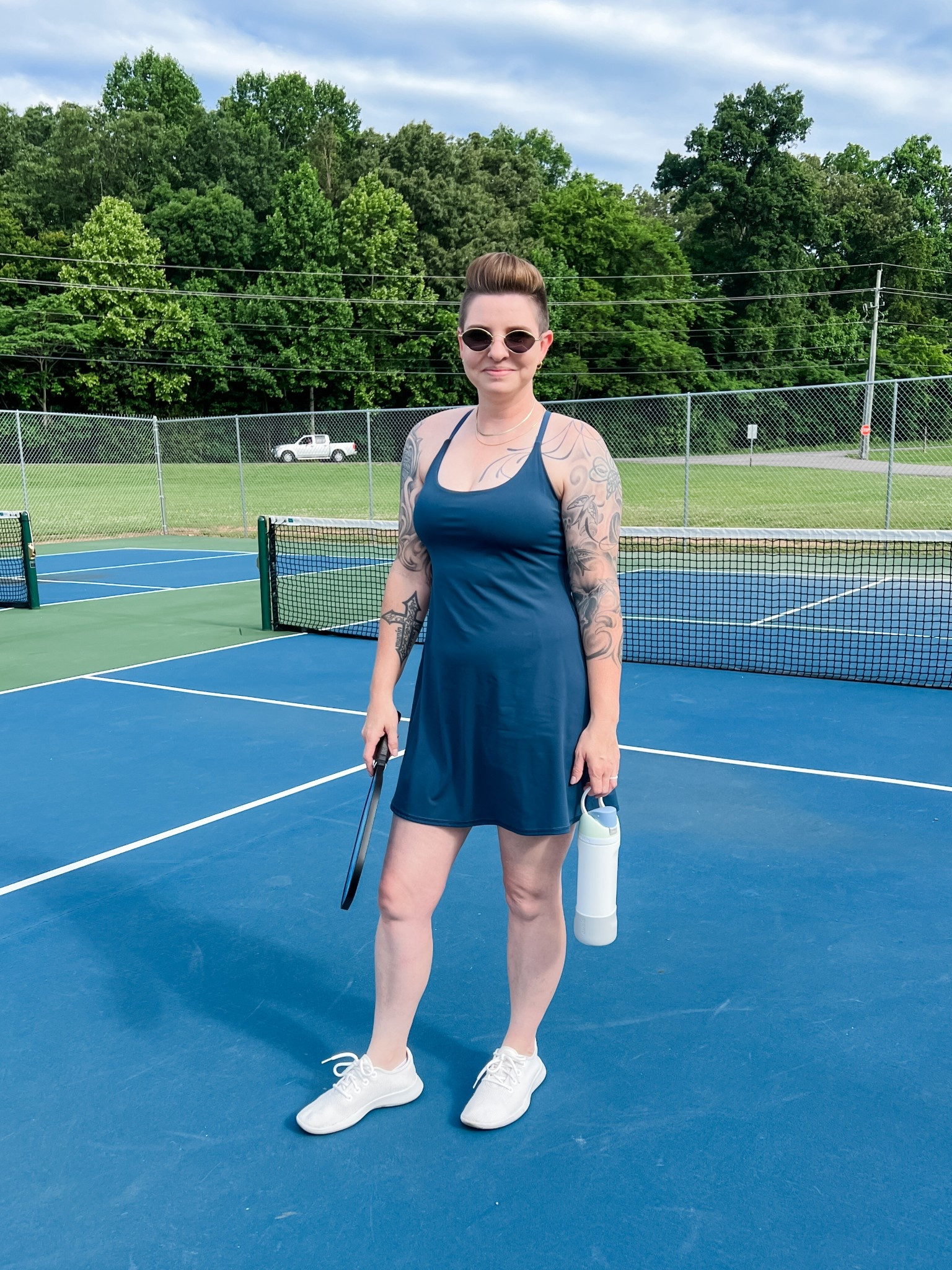 Dressed like someone who knows what she’s doing on the pickleball court… 😅 I love this tennis dress though. It’s super comfy and has a built-in bra AND shorts with phone pockets! And the sneaks are so perfect for chasing balls onto other people’s courts. (No, I am not great at this sport)

#LTKActive #LTKFindsUnder50 #LTKSaleAlert