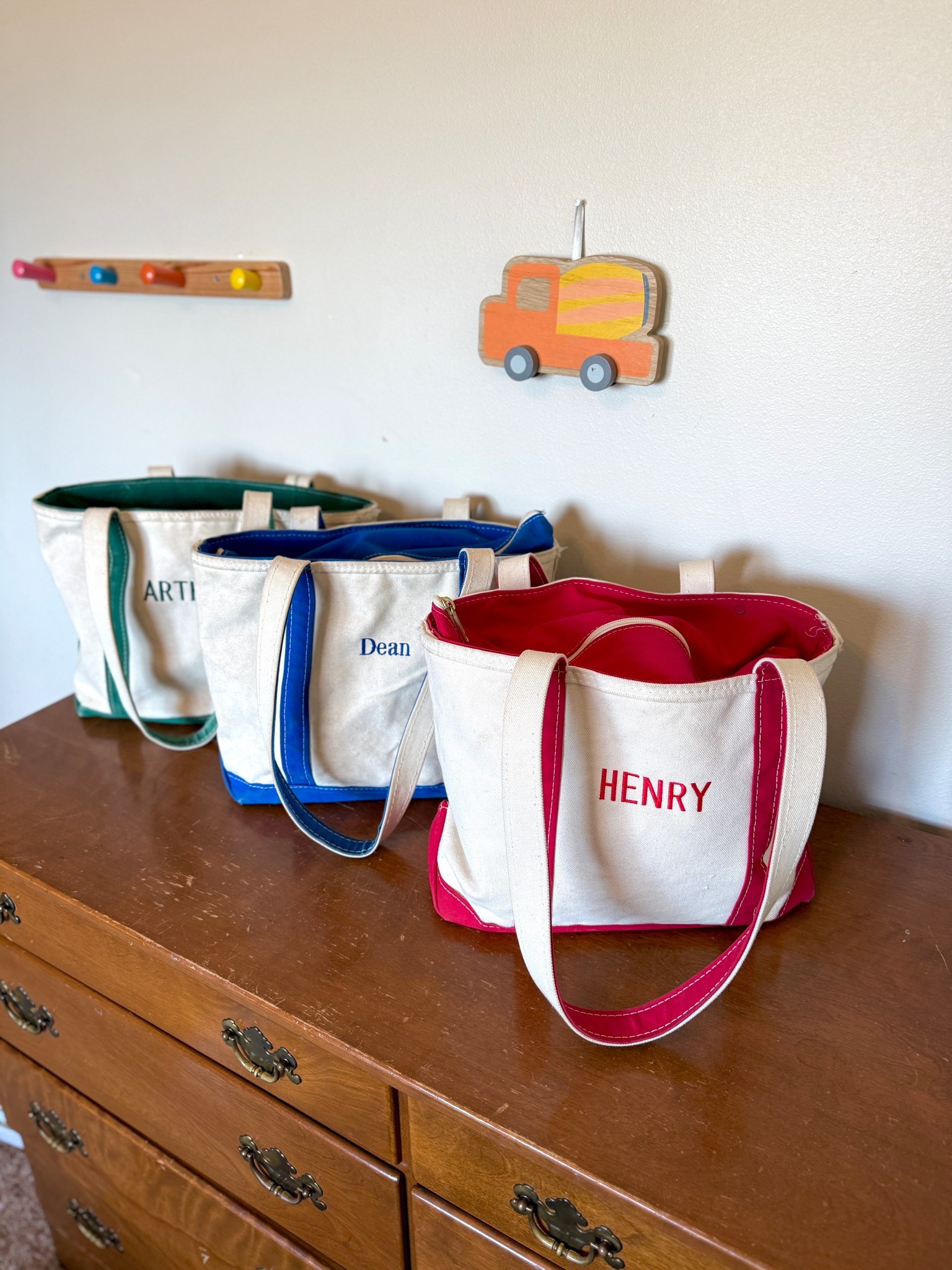 These have been my GO-TO bags since Dean was born, and I’ve followed the same tradition with all three boys 🤍

They’re the perfect size for:
• Daycare
• Travel
• Day trips
• Even as a diaper bag for a season

I order the medium and always choose the long handles — it makes such a difference for carrying on your shoulder 🙌🏼

I love that you can:
✔️ Monogram their names
✔️ Color coordinate for each kid
✔️ Zip the top closed (huge mom win)

Such a practical but special item we’ve used for years 🫶🏼

#LTKTravel #LTKmomlife #LTKKids