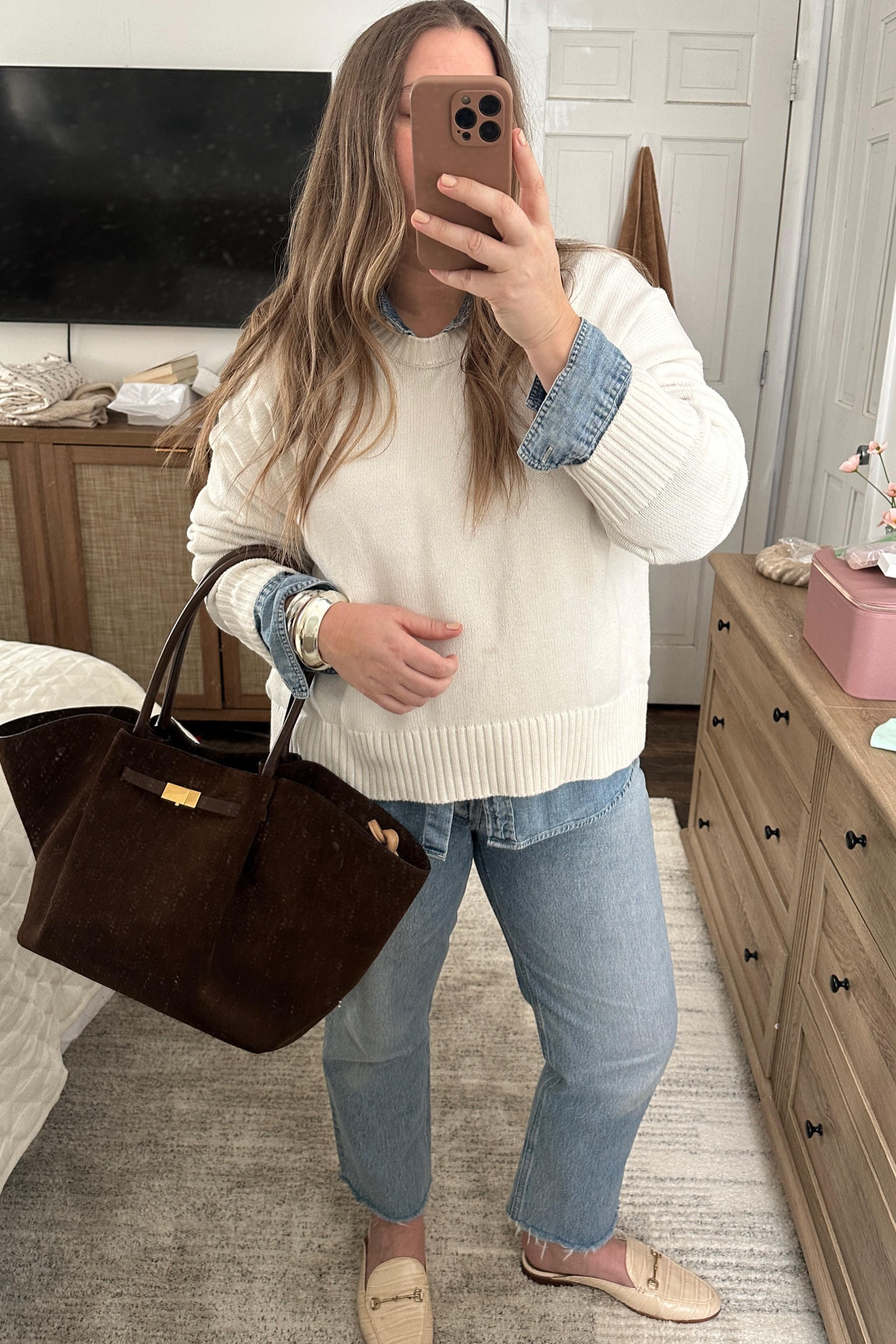 Quince sweater: medium ( slightly oversized) 

Jeans- tts or size up if inbetween ( true 100% cotton denim- no stretch) my wash is low in stock but this style ( riley crop) is perfect for under 5’4. I have this style in 4 washes! My wash is zephyr for second hand sights but i linked other light washes i know are close 

Office outfit 
Casual outfit
Chambray
Demellier
Quince
Cotton sweater
Agolde

#LTKMidsize #LTKSaleAlert #LTKSeasonal