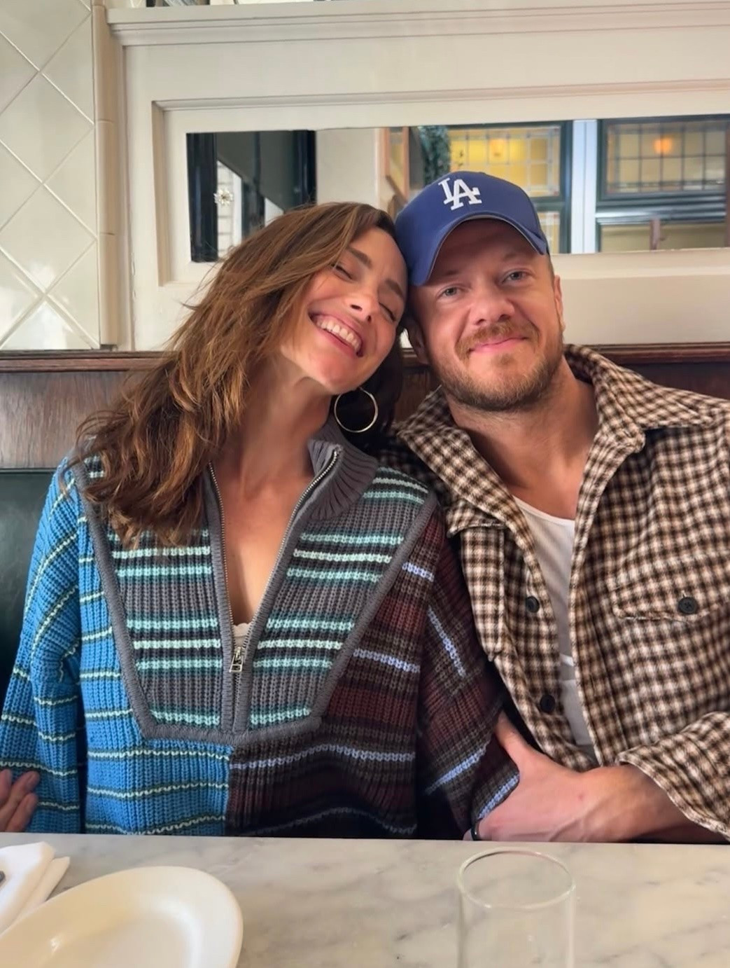 Minka Kelly's cropped mock neck long sleeve half zip closure sweater ￼