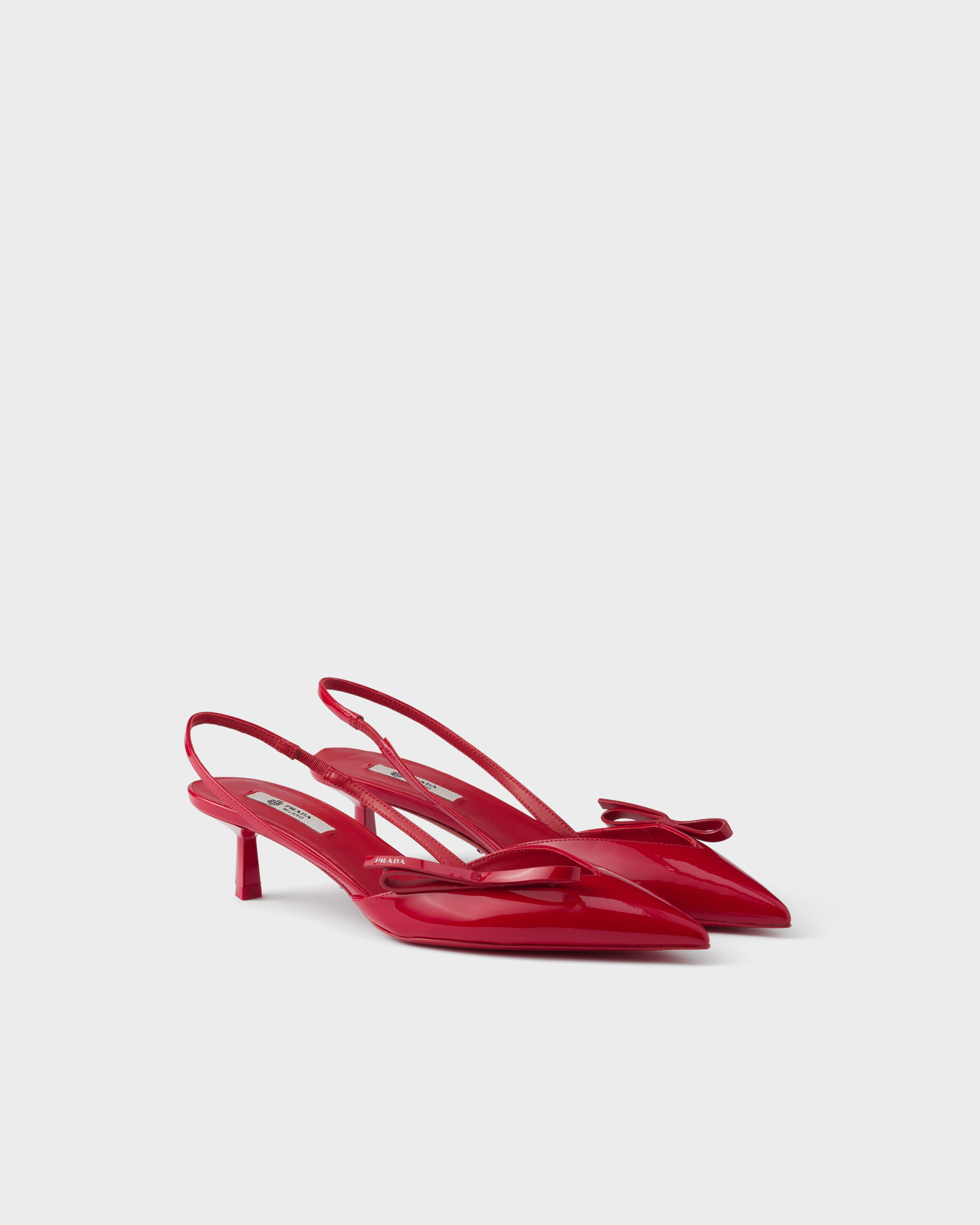 Patent leather slingback pumps | Prada US