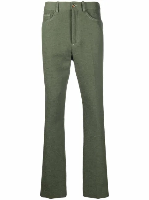 embroidered-logo flared trousers | Farfetch (US)