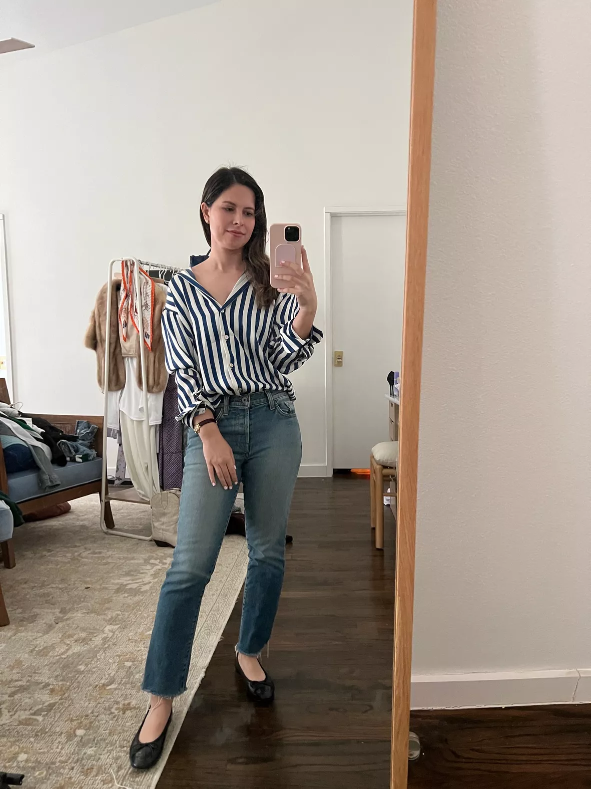 Striped top. Ripped jeans. Chanel ballet flats