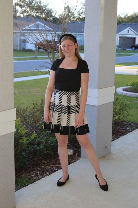 Knit skirt and black square neck fitted top  