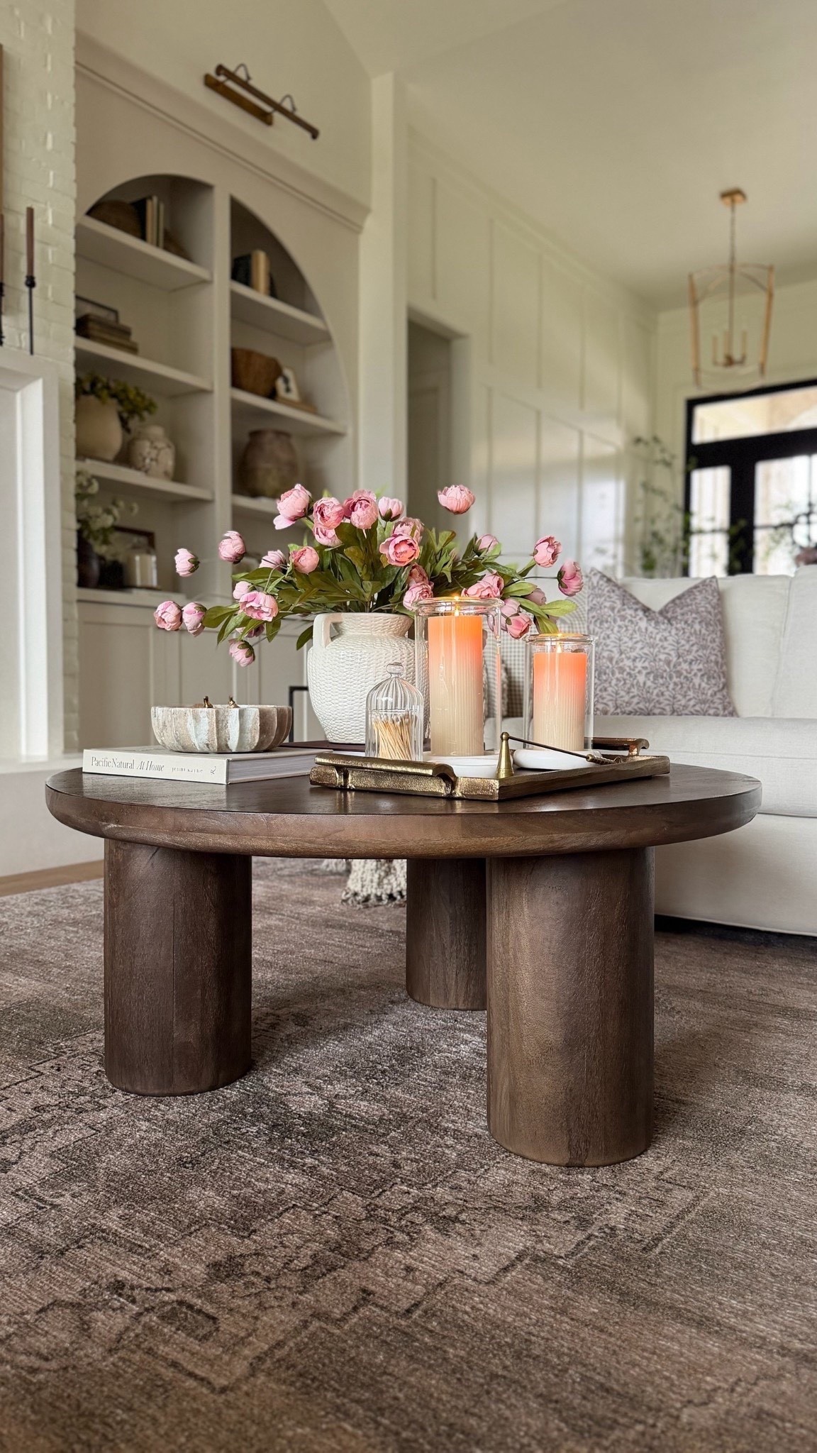 These pink peonies give just the right amount of color to our living room for spring! They’re a faux silk and very beautiful. Easy to style, and affordable, too!

#LTKHome