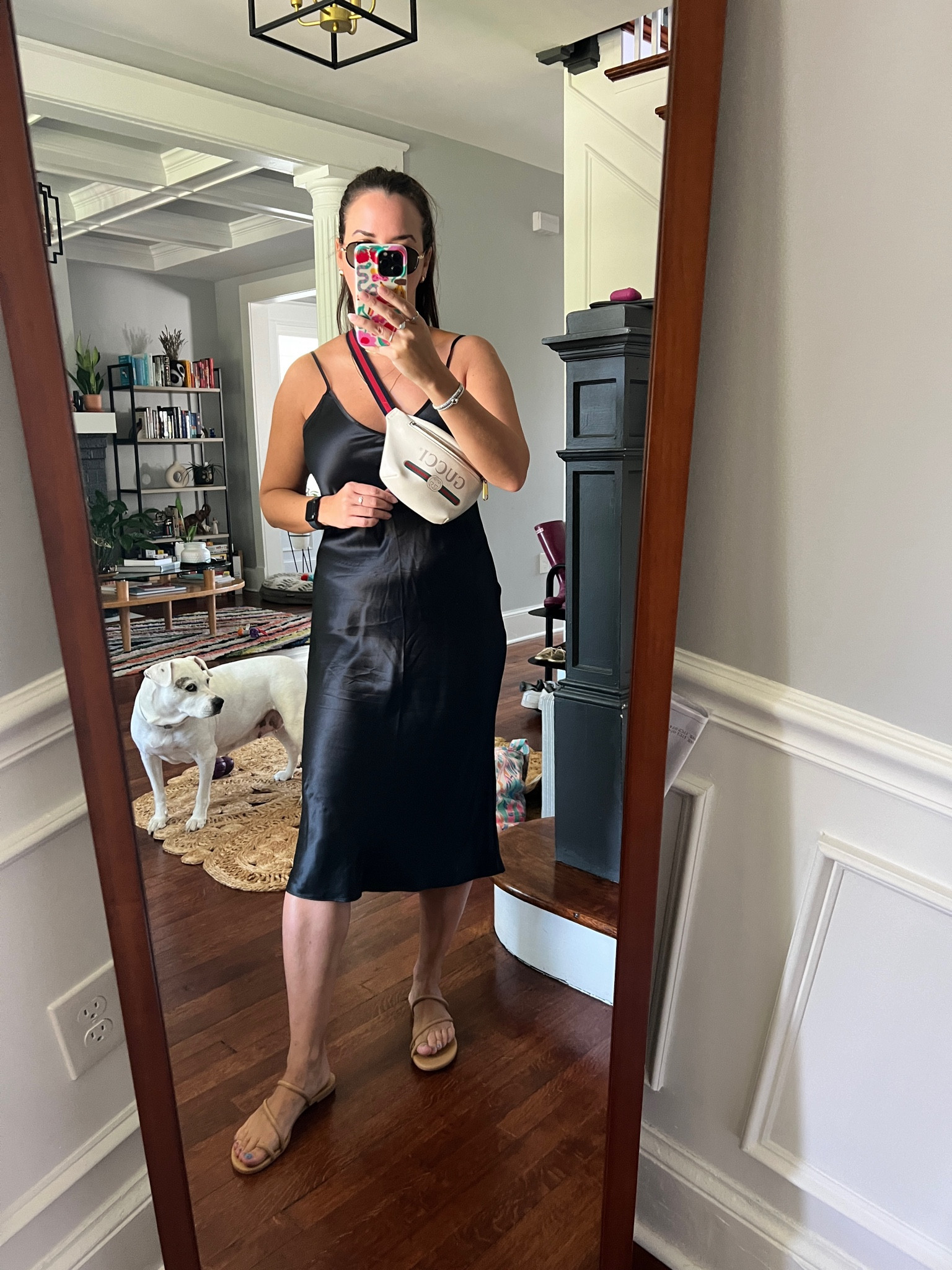 Quince. Black slip dress. Gucci belt bag.
