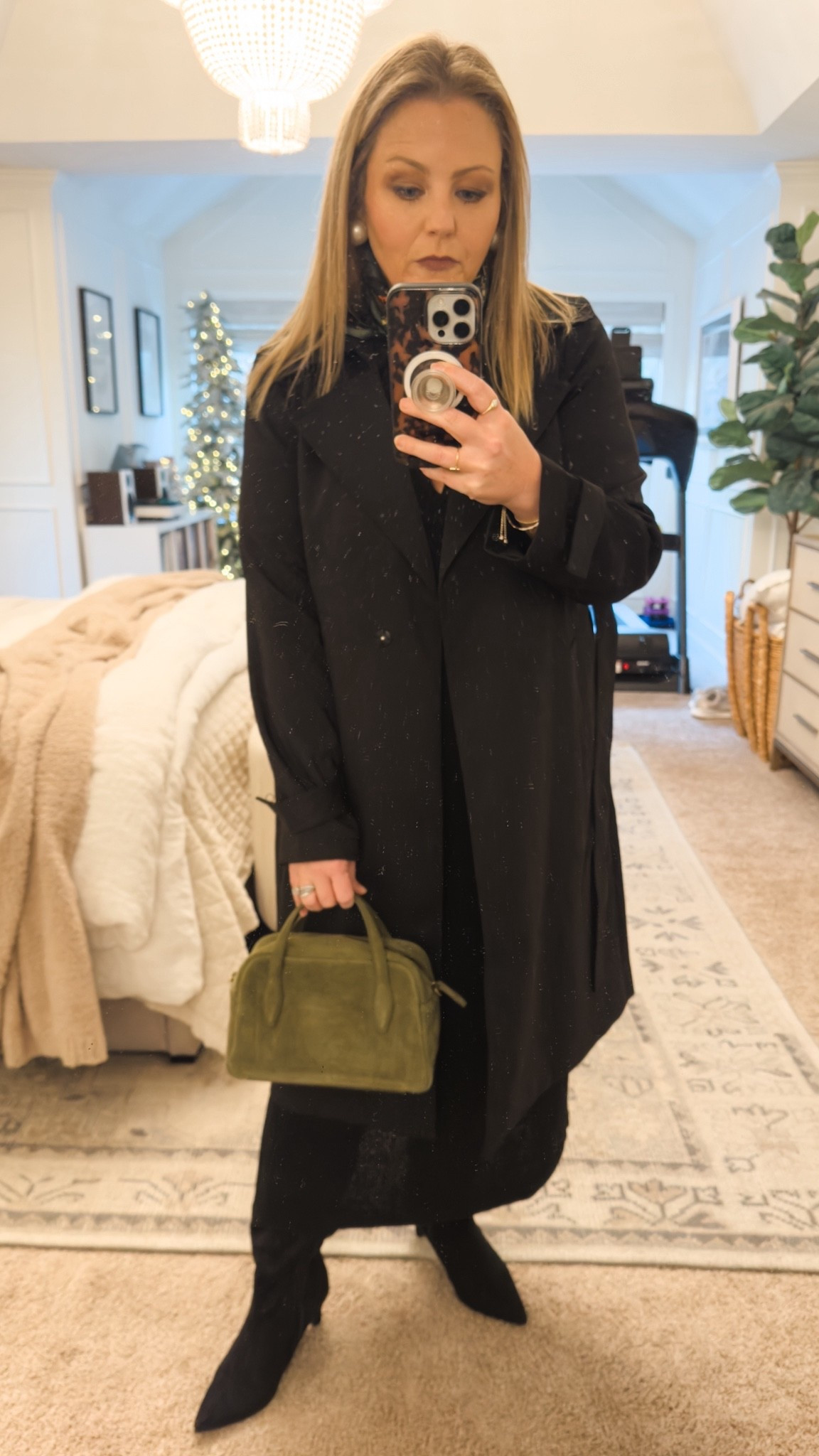 I treated myself to this moss green that’s the perfect size to hold all of the essentials. It’s available in several different colors and is currently on sale! Here it’s paired with my favorite black trench coat and black suede boots. fall outfit gift idea for her work outfit work wear church outfit lightweight coat

#LTKOver40 #LTKWorkwear #LTKGiftGuide