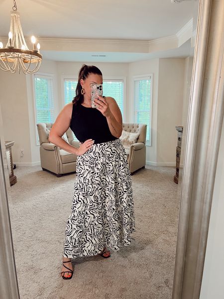 Simple vacation outfit, I’m wearing a Large in the skirt and its roomy. 

#LTKSeasonal #LTKFindsUnder50 #LTKMidsize