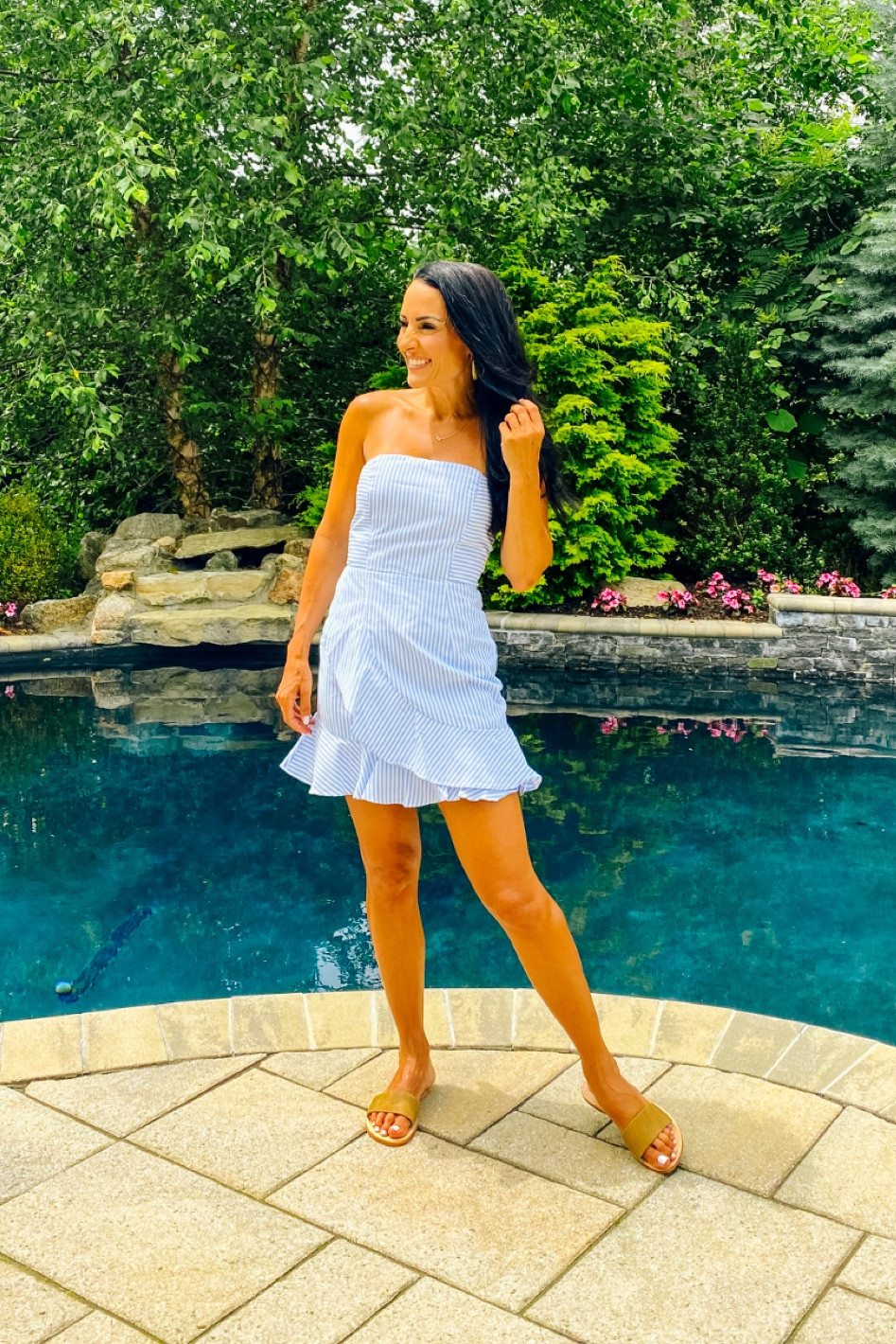 Stripped strapless mini dress and slides 

#LTKunder100 #LTKstyletip #LTKtravel