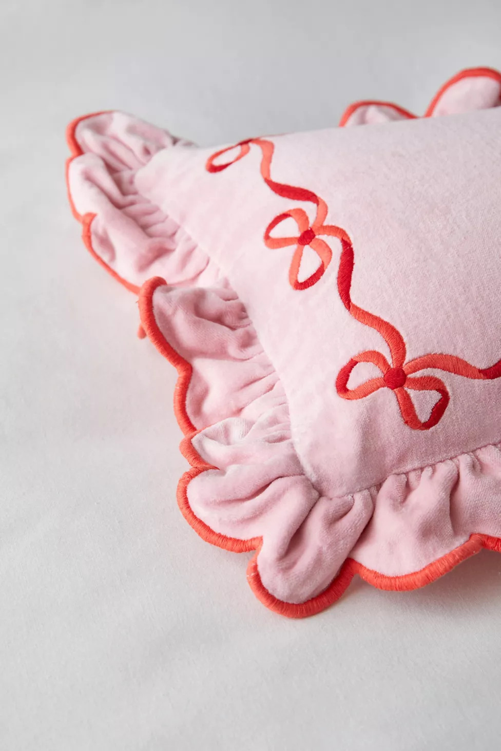 Lacey Bows Velvet Ruffle Bolster Pillow | Urban Outfitters (US and RoW)