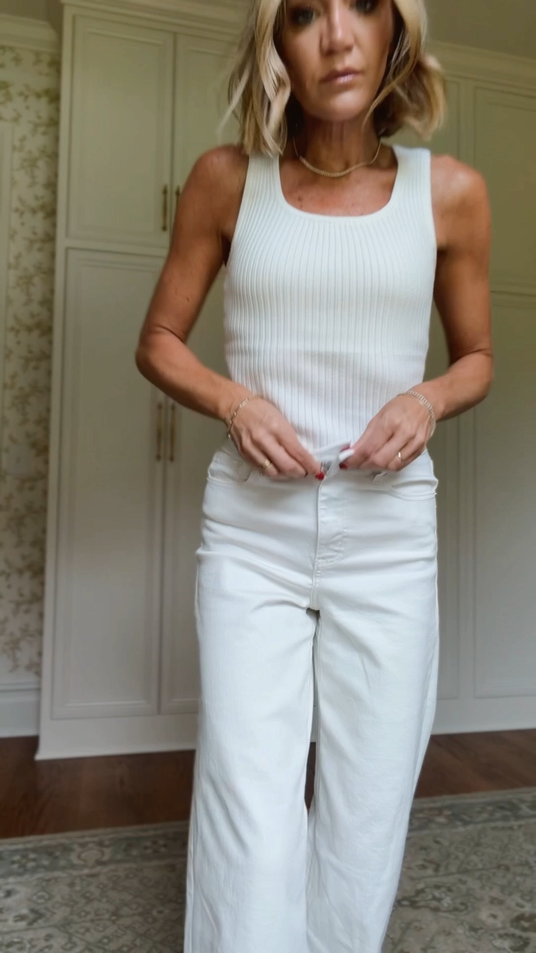 Small in knit tank 
Size up one in the jeans 
Small in skort