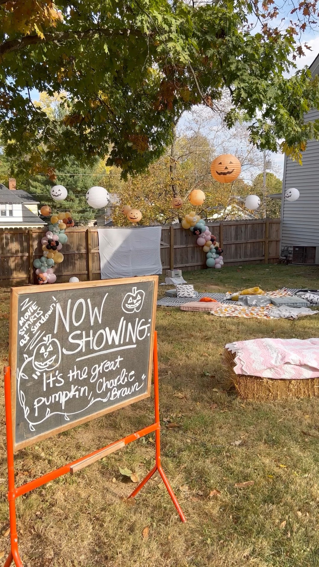 🎥🌙🎬🎃Halloween Outdoor Movie Night🎃🎬🌙🎥 I’ve always kind of been obsessed with movie nights and have hosted them all throughout my life. In college I would have an annual Halloween party and have a scary movie marathon outside, my friends and I also hosted themed movie nights all throughout the summer, and now I love hosting cozy and cute Halloween movie nights for my son and his friends! There are so many affordable projector options now (if you have any questions about options, just ask, because I own or have tried them all 🤣) and you can just hang up a sheet for a screen or spring for a fun giant inflatable screen! I also love setting up a popcorn bar with all the toppings and add-ins! For seating, just spread out quilt, blankets, and pillows on the ground and hay bales also work great!  Since our movie area is under a tree, I took advantage and hung lots of Halloween lanterns to make it even more magical! I also hung these battery powered mini lantern pumpkin lights from garden hooks on each side to create a little perimeter for the party and add more light! For all my movie night essentials links just comment MOVIE below! {balloons by @elevatedballoonsanddesignco } #gatheredlivingfall 
.
.
.
.
#halloweenqueen #halloweenmovienight #halloweenreels #halloweenmovie #halloweenmovies #kidshalloween #halloweenplayroom #kidshalloweenactivities #halloweenfun #halloweenmovienights #halloweenslumberparty #halloweenforkids #halloweendecor #cozyhalloweendecor #cozyhalloweenmovienight #halloweendecorations #decorreels #itsthegreatpumpkincharliebrown #cozyhalloween #charliebrownhalloween #outdoormovie #outdoormovienight #halloweenoutdoormovie #halloweenoutdoormovienight #falloutdoormovienight #cozyoutdoormovienight #movienight🎬 #movienights #itsthegreatpumpkincharliebrown #greatpumpkinparty

#LTKhome #LTKSeasonal #LTKHalloween