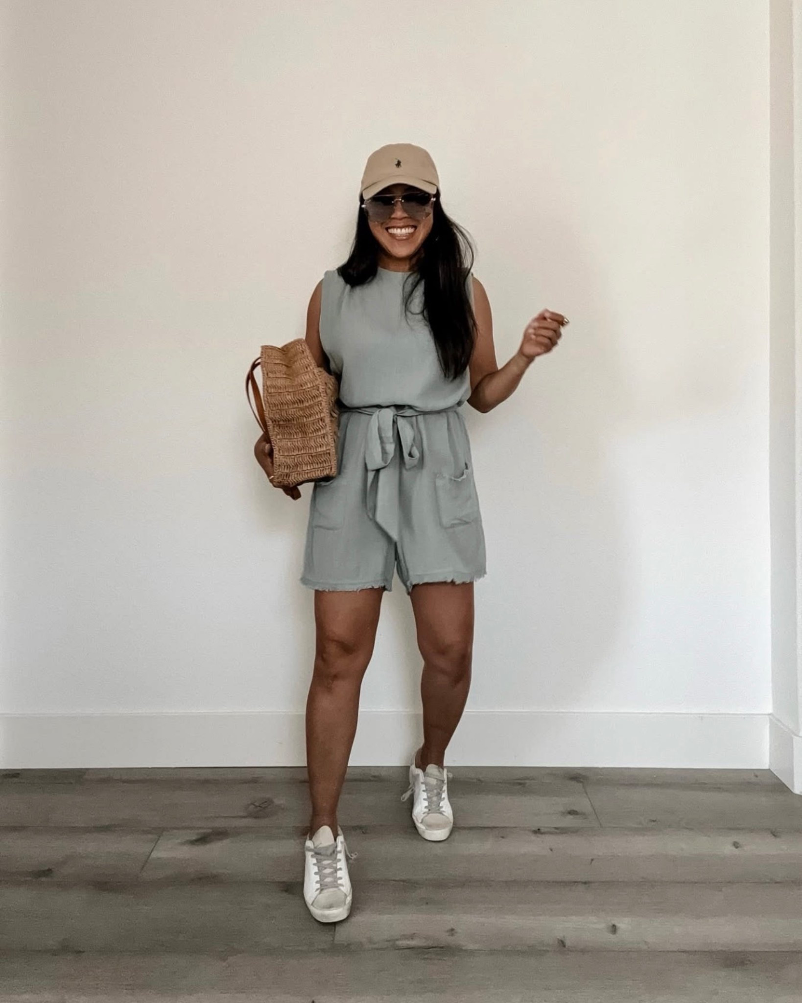 green romper // white sneakers // straw tote bag // beige cap // spring style 

#LTKPetite #LTKSaleAlert #LTKOver40