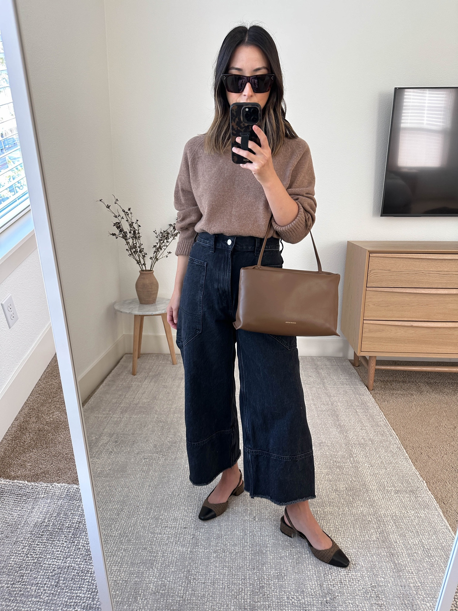 Everlane Gardener jeans. Very wide leg. Almost has a horseshoe leg. I went up a size for a relaxed waist and cut the hems. Very comfy. 

Everlane sweater xs
Everlane jeans 25. 
Veronica Beard sling backs 5
Mansur Gavriel bag 
Celine sunglasses  

#LTKSeasonal #LTKshoecrush #LTKitbag
