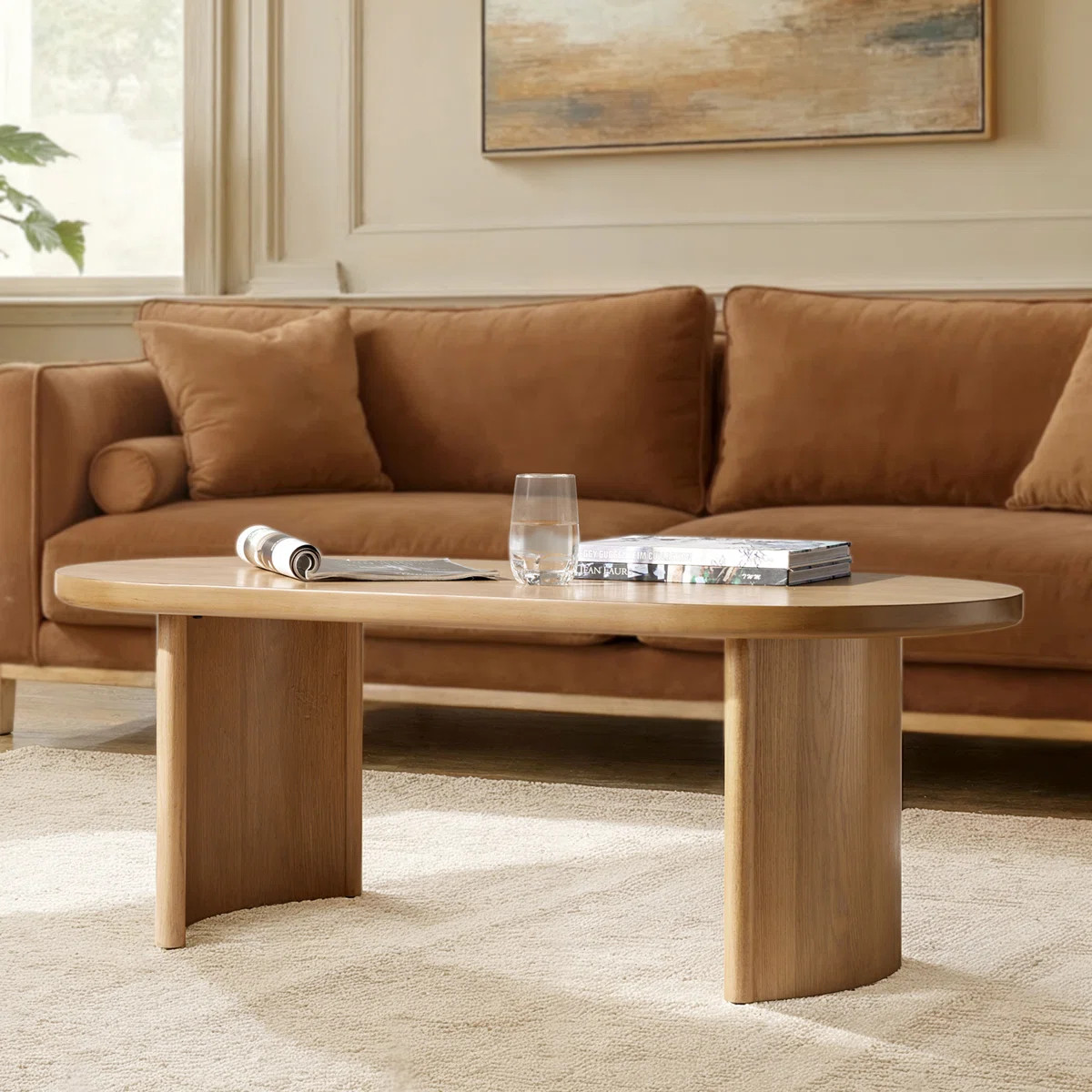Jesusa Modern 47"W Oval Coffee Table with Solid Wood Adjustable Legs | Wayfair North America
