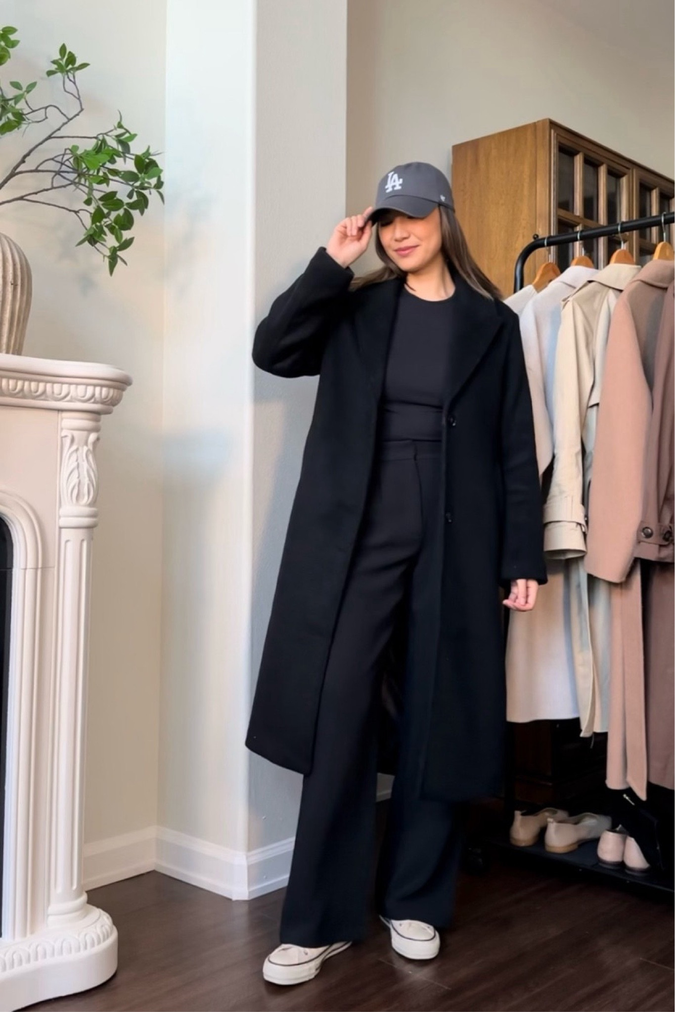 10 pieces, 10 outfits - winter outfit 🖤

• coat xs 
• top xs 
• trousers - run a little tight on the waist, wearing my normal size 25 regular 
• baseball cap 
• converse - vintage white 

#LTKtravel #LTKfindsunder100 #LTKstyletip