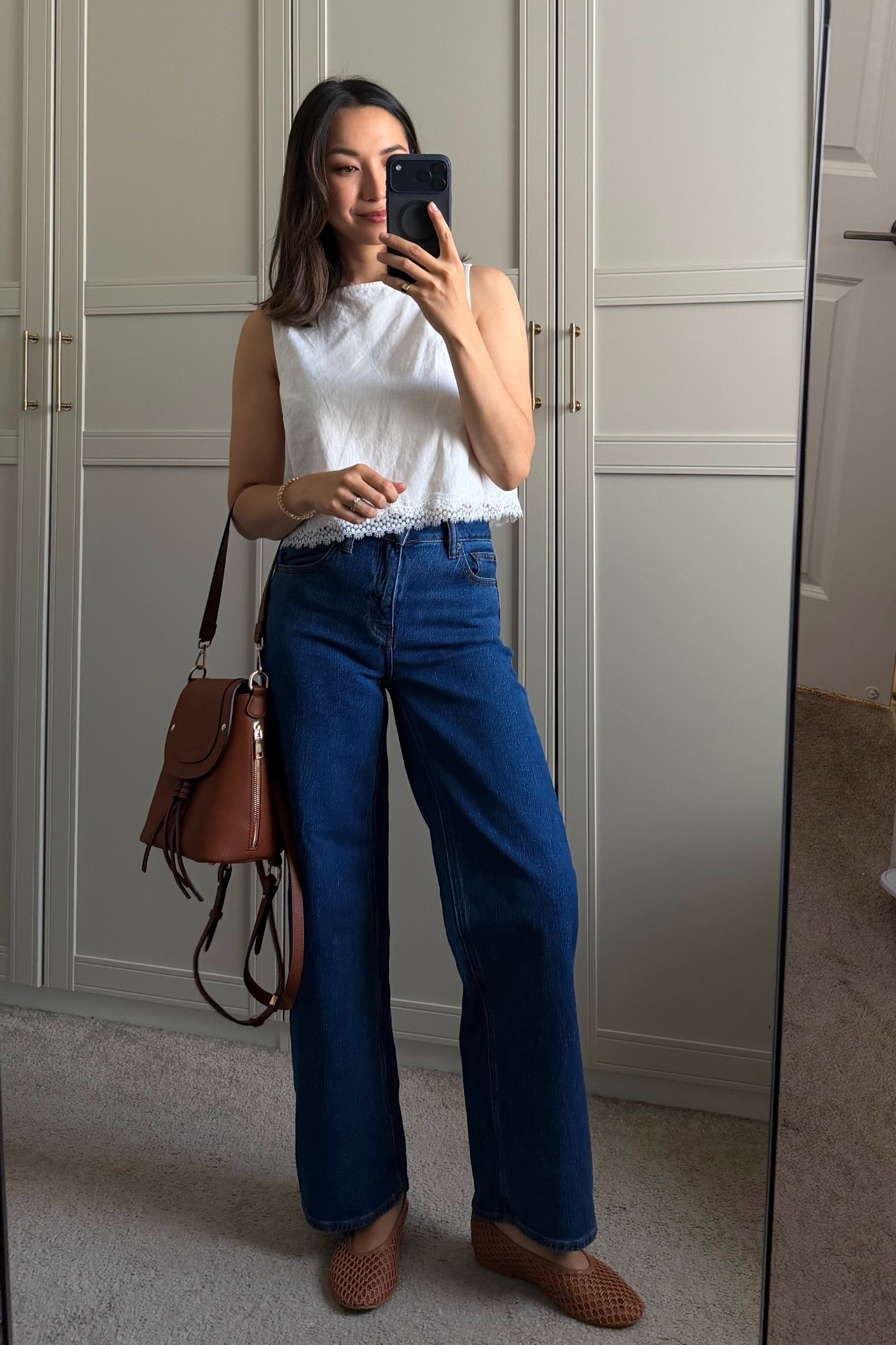 Spring/ summer outfit with mesh flats 

Gap top — xs 
Quince Bella relaxed jeans 
Calvin Klein mesh flats 

#LTKootd