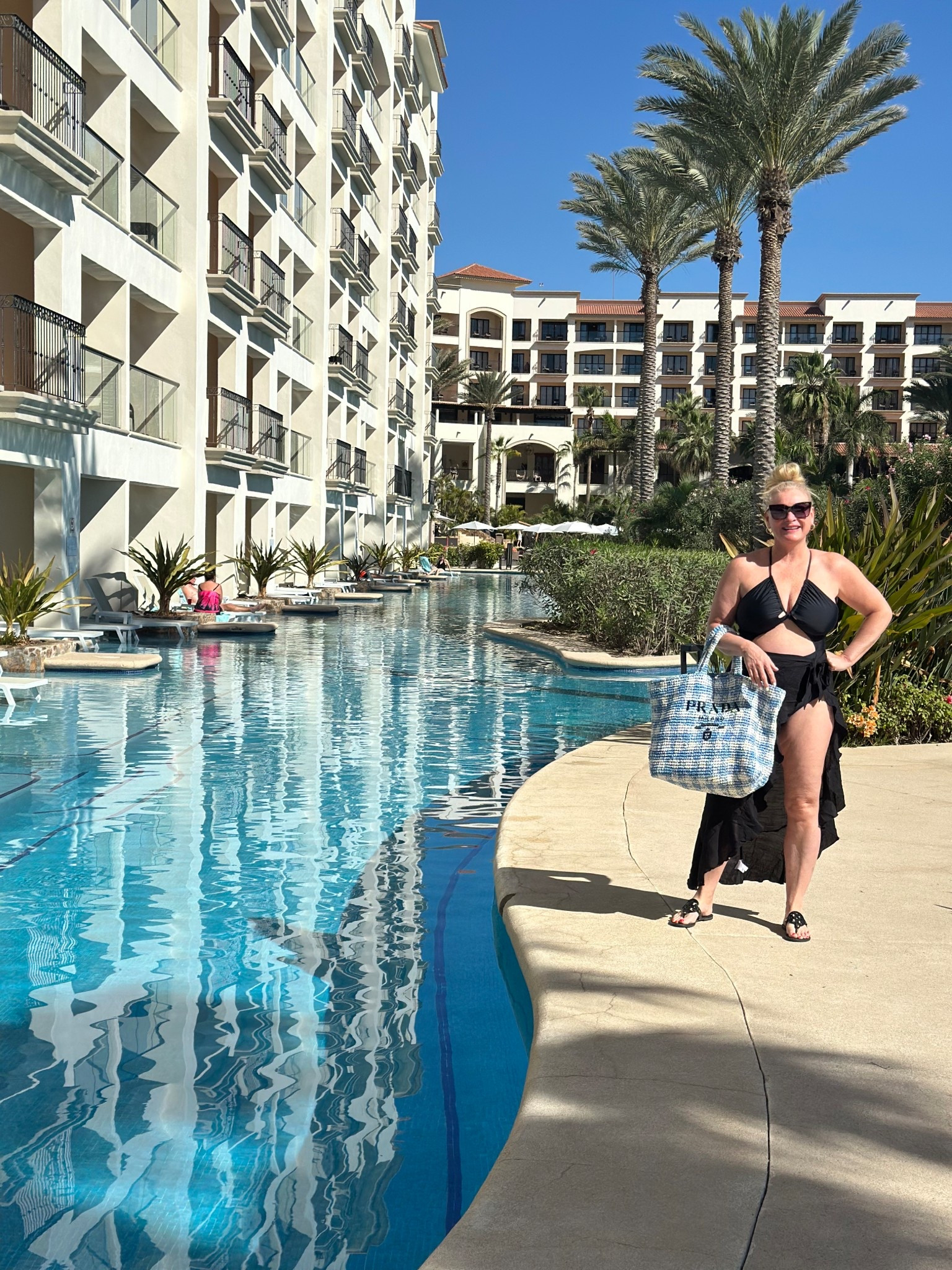 Spring Break POOLSIDE OUTFIT ☀️🌴

Chic but cozy, I'm loving my ruffle sarong wrap swim skirt coverup paired with the checked Prada straw handbag 🤍

Sunglasses/ Swimwear/ Prada/ Tory Burch/ Wrap Skirt/ Springbreak/ Travel/ Cabo/ Vacation 

#LTKSwim #LTKTravel