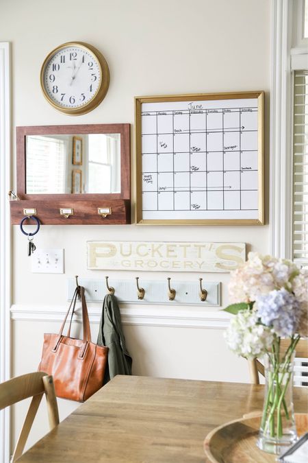 It’s easier to keep our family organized and informed with this dry-erase monthly calendar, clock, mail/key mirror and hooks for backpacks and purses.

#LTKHome