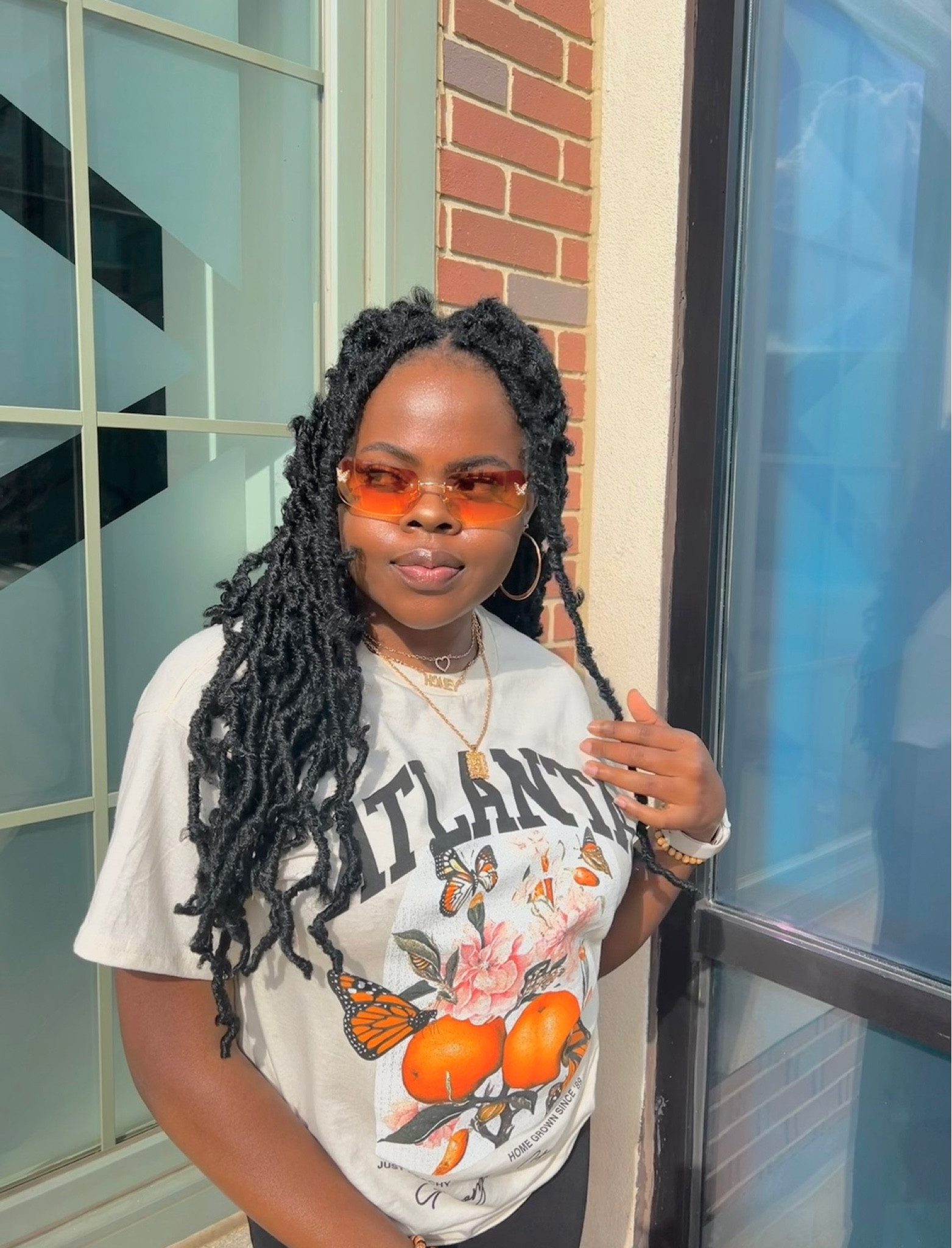 this really cute Atlanta graphic tea from fashion. Nova is perfect for any streetstyle outfit! The material is amazing and it is true to size and I decided to wear it with orange sunglasses from Amazon.

#LTKstyletip #LTKfindsunder50 #LTKSeasonal