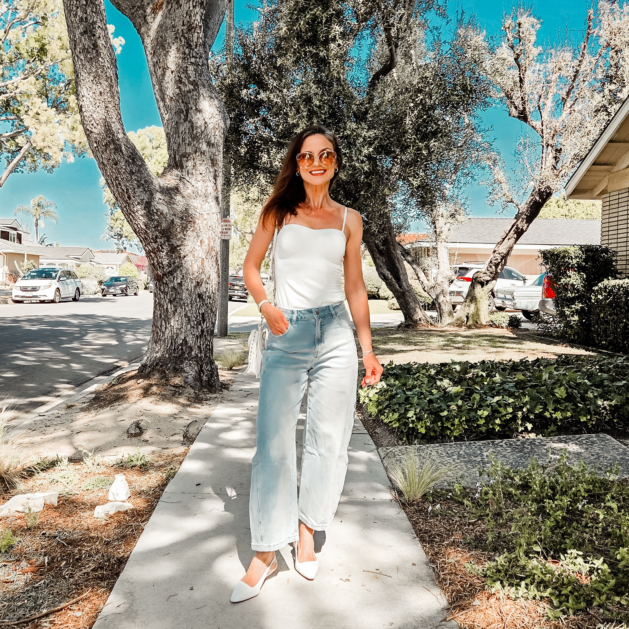 Super cute spring 4-in-1 top (bra, shapewear, tank top or tube top) and high-rise barrel jeans! 👖🤍 I am 5'10 and wearing size small in both items! 

#LTKootd #LTKOver40 #LTKTall