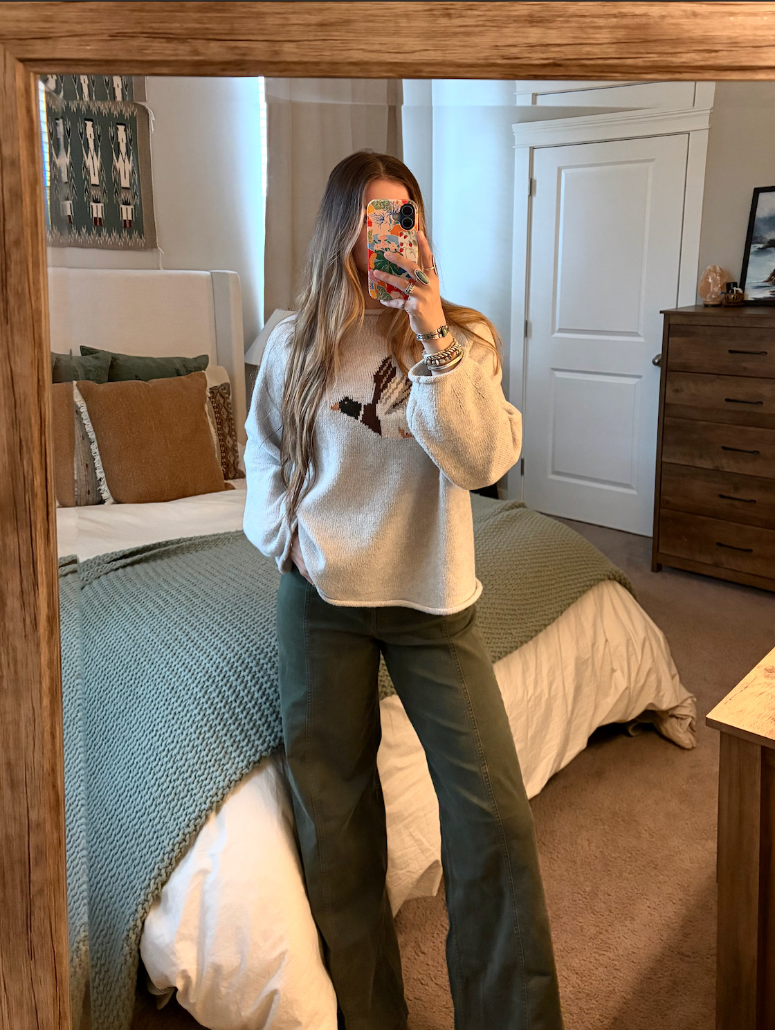 Small in sweater 
27 in jeans