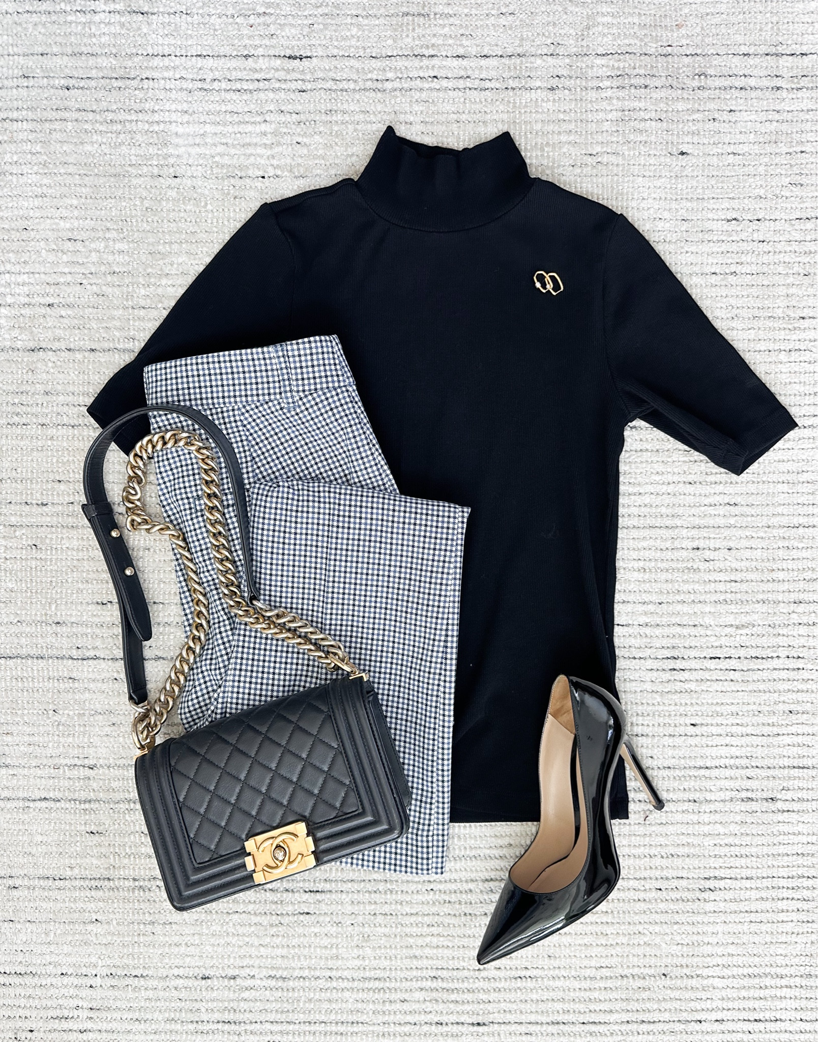 Houndstooth work pants paired with black mockneck and pumps for a classic look. Top, coat,  and bottoms are on sale for an extra 40% off! 

#LTKWorkwear #LTKSaleAlert #LTKStyleTip
