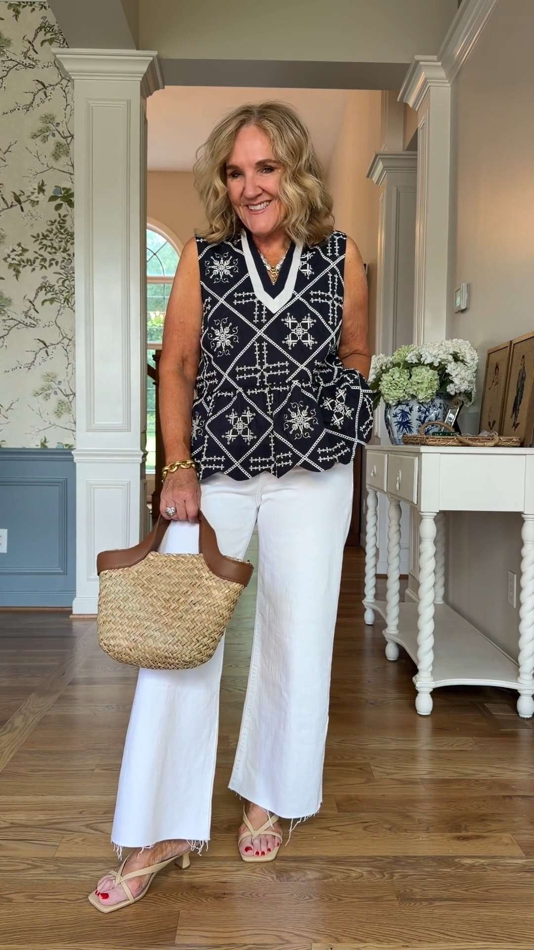 It always feels polished, always feels classic, and somehow works for just about any occasion. The embroidered details on this sleeveless top give it personality, while the white pants keep everything looking crisp and fresh. 🫶🏻 

 #LTKootd #LTKSeasonal #LTKOver40