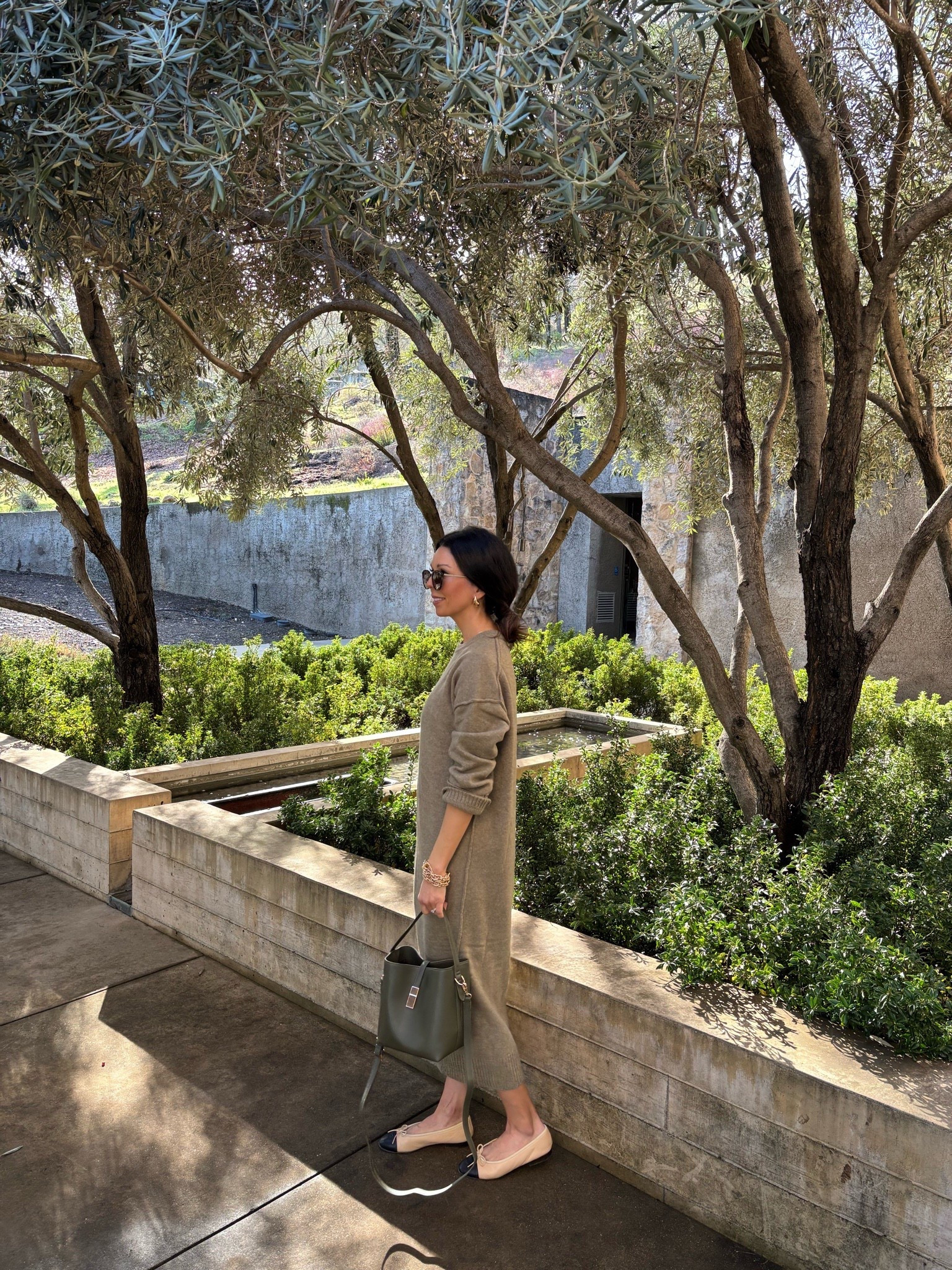 On SALE. My olive green knit maxi dress is on sale for under $40! It runs nice a roomy. I’m wearing a small here.
Olive green bag. 
Chanel cap toe ballet flats. 
Ray-Ban sunglasses. 

Knit dress
Mango sale
Knit dress
Napa Valley outfit 
Wine tasting outfit 

#LTKSaleAlert #LTKOver40 #LTKSeasonal