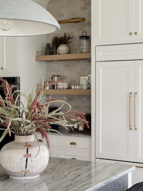 Leaning into deep earthy tones this Fall. I styled this new @potterybarn vase and floral in the kitchen. 

#falldecor #fallinteriors #falldesigninspo #fallhomedecor #fallvibes #fallhome #fallhomedecorating #cozyhomes #cozyhomevibes 

 #LTKHome