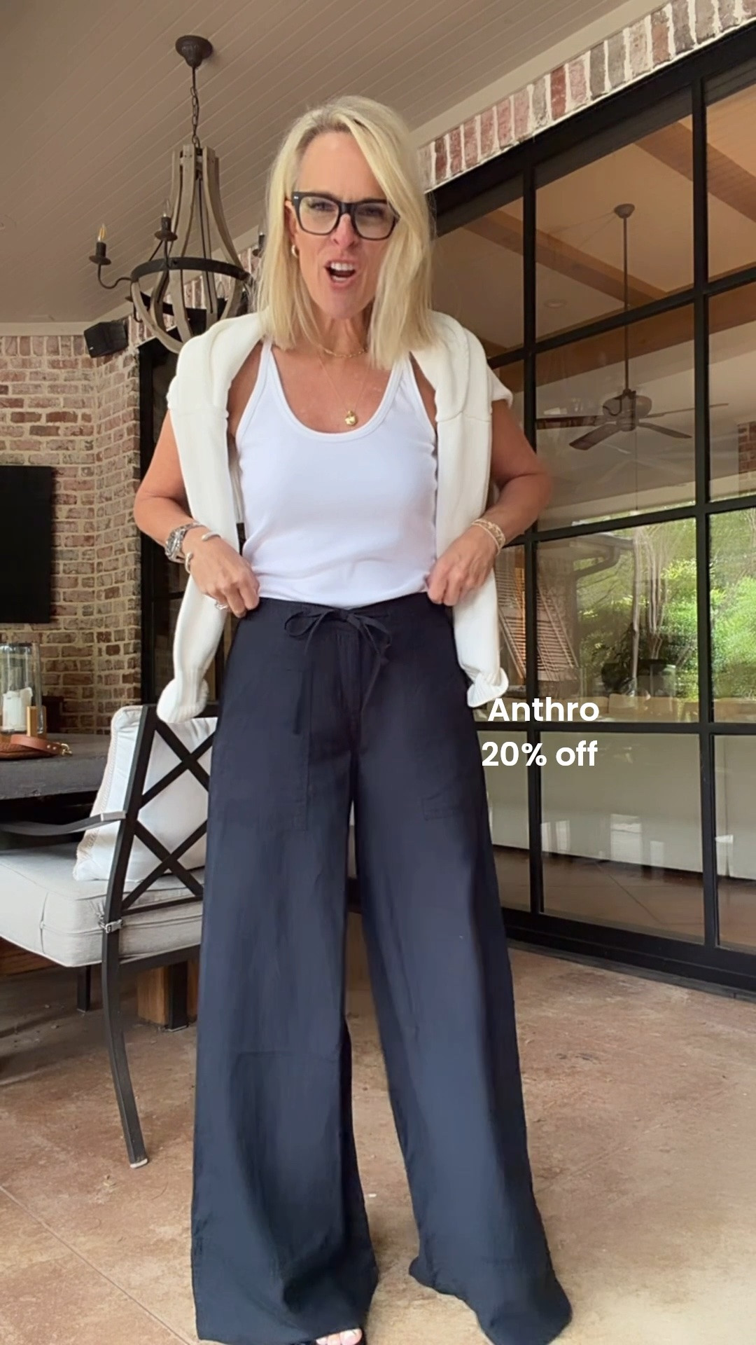 LOVE these wide leg black pants. Can be dressed up or down 

Sizing - went down one size to XS 

also cannot say enough good things about these tank tops come in multiple colors, and under $40 

@Anthropologie ￼

#LTKootd #LTKSaleAlert #LTKOver40