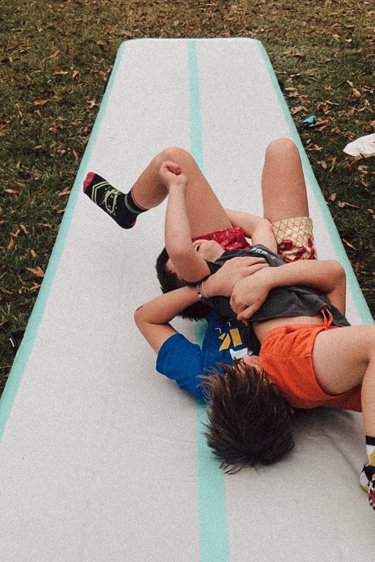 This tumbling mat was intended for gymnastics practices at home, but has equally hosted horse play from the boys. 10/10